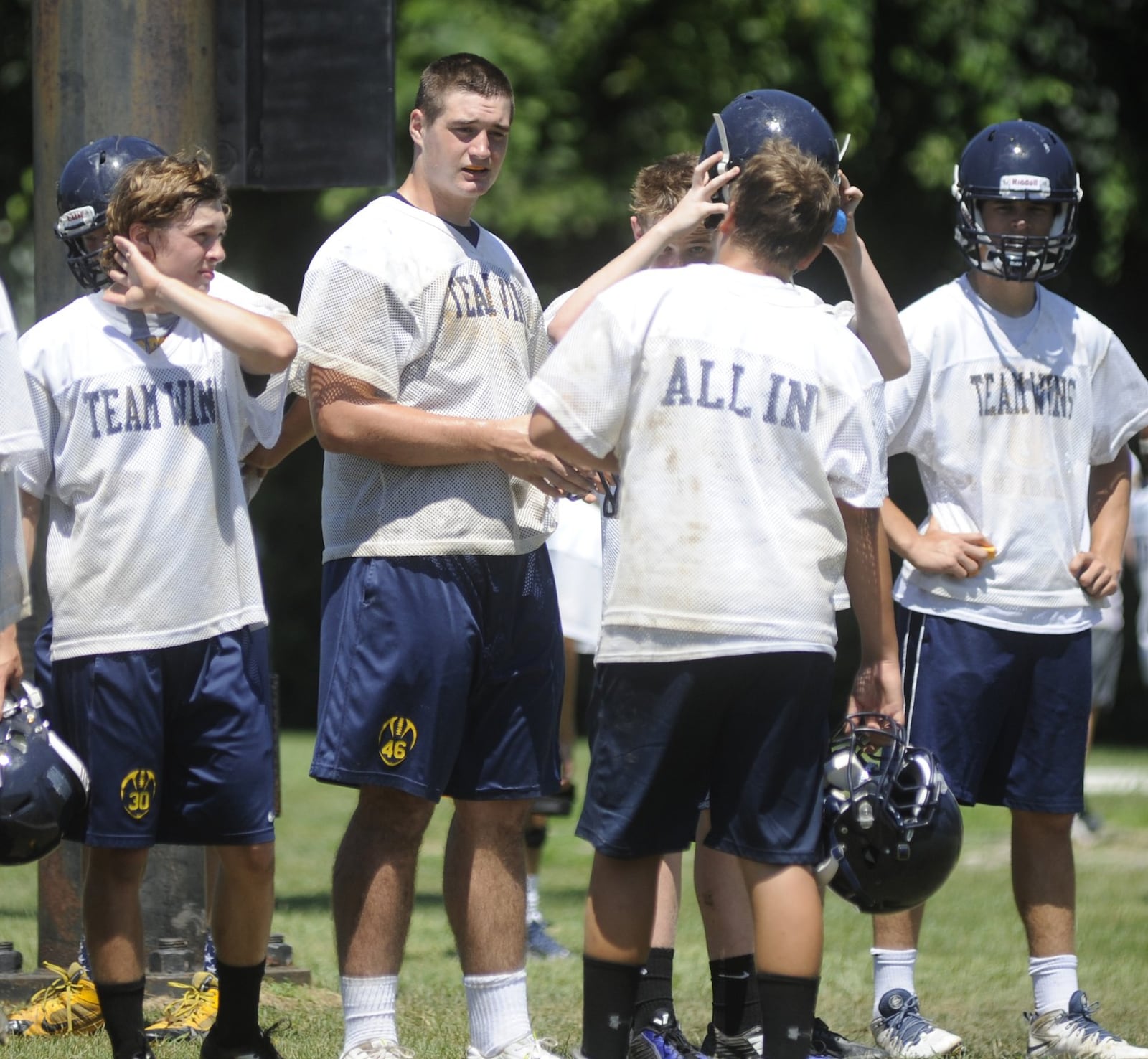 Oakwood High School senior FB/DE Michael Hoecht (second from left) had a 99-yard TD run last season. MARC PENDLETON / STAFF