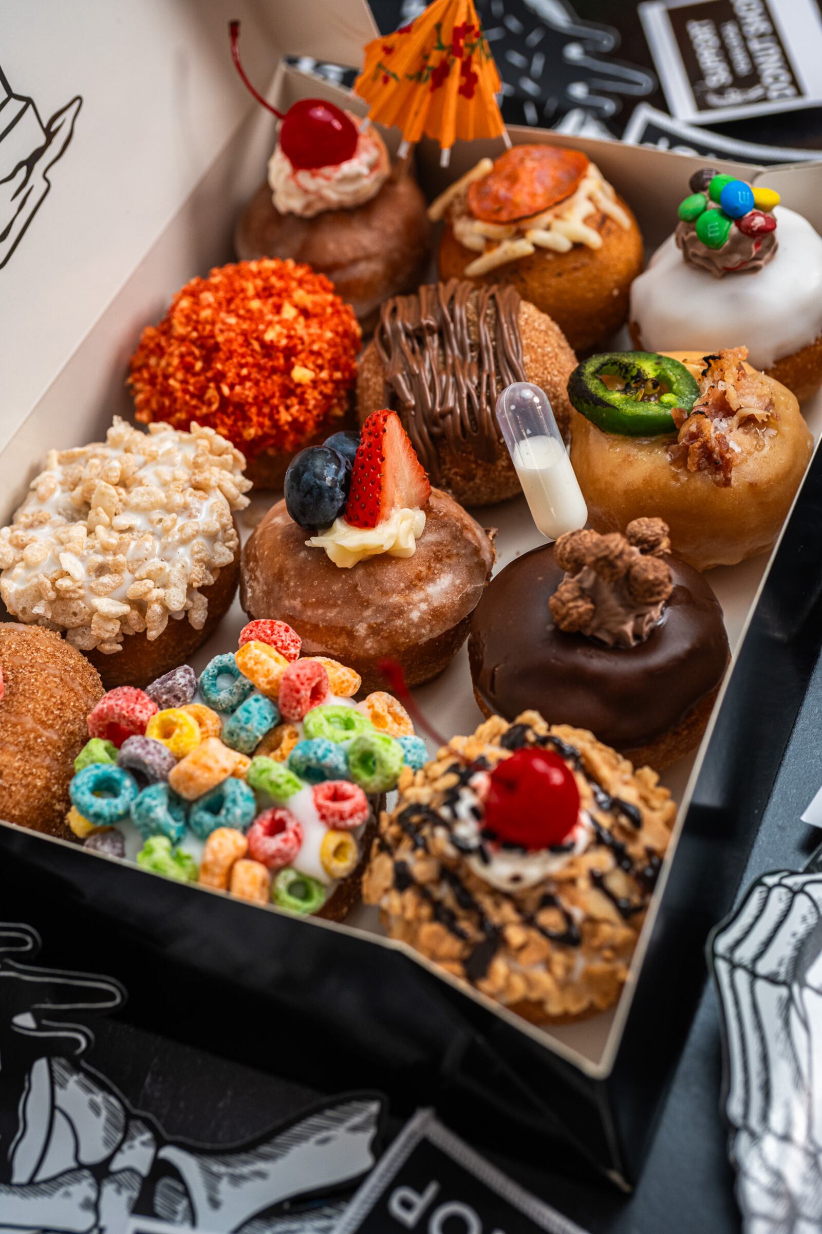 For National Donut Day on Friday, June 7, Death Grip Donuts has released 14 new creations including savory donuts. This brings their menu total to 32 three-bite donuts (Photo Courtesy: Shutter Steve Photography).