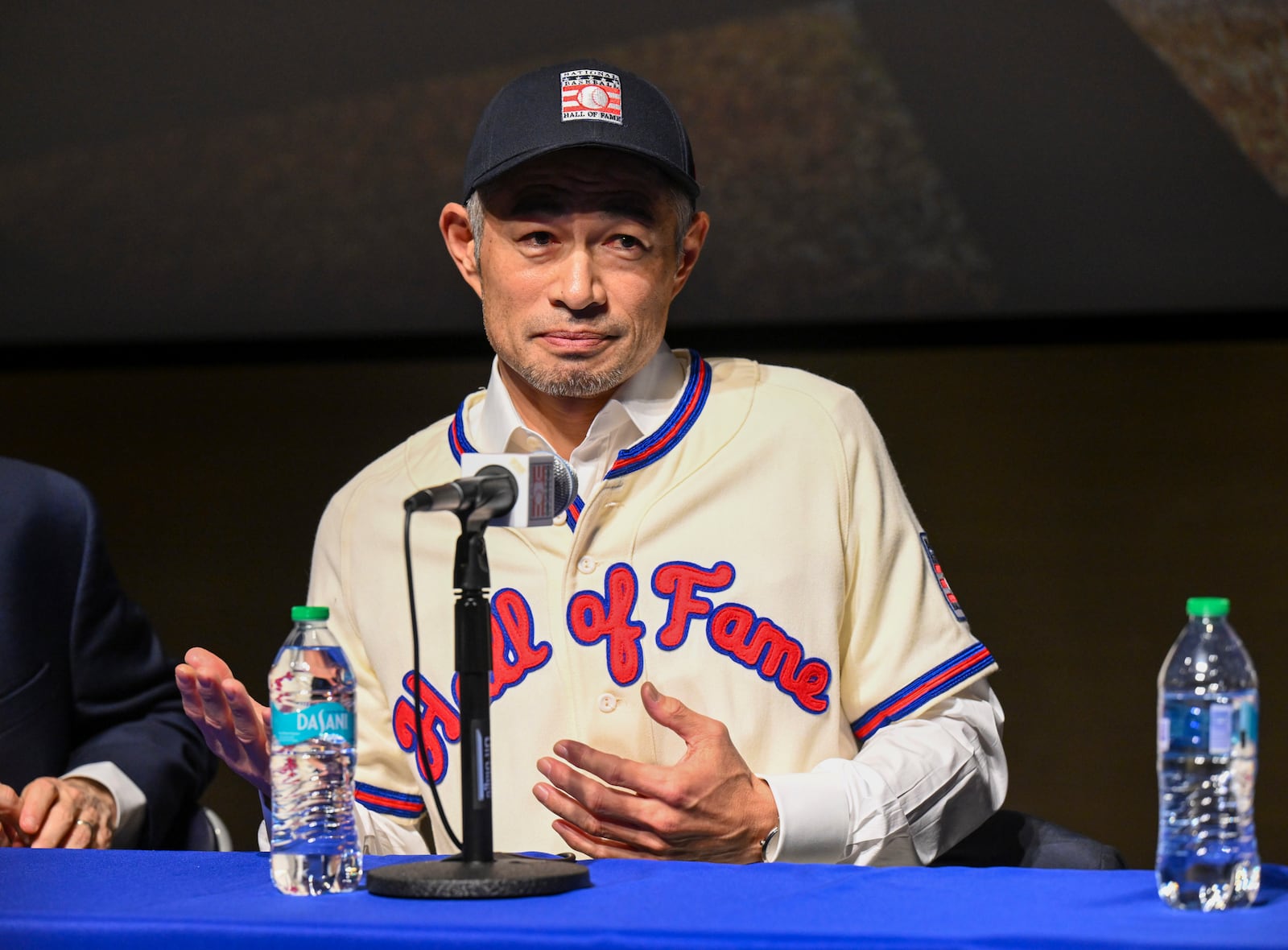 Newly elected Baseball Hall of Fame inductee Ichiro Suzuki talks to reporters during a news conference Thursday, Jan. 23, 2025, in Cooperstown, N.Y. (AP Photo/Hans Pennink)