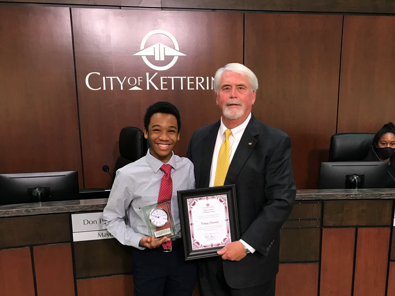 Don Patterson presents the 2021 Kettering Mayor’s Award for Volunteer Service to Tahjey Lawson. The award goes to one adult and one student each year.