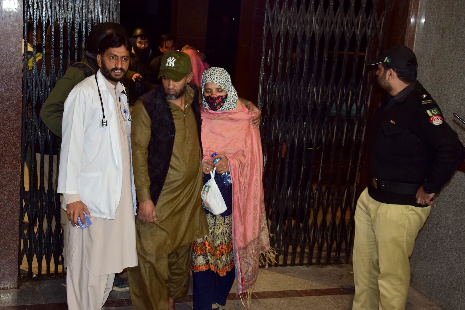 Passengers rescued by security forces from a passenger train attacked by insurgents arrive at a railway station in Quetta, Pakistan, Wednesday, March 12, 2025. (AP Photo/Arshad Butt)