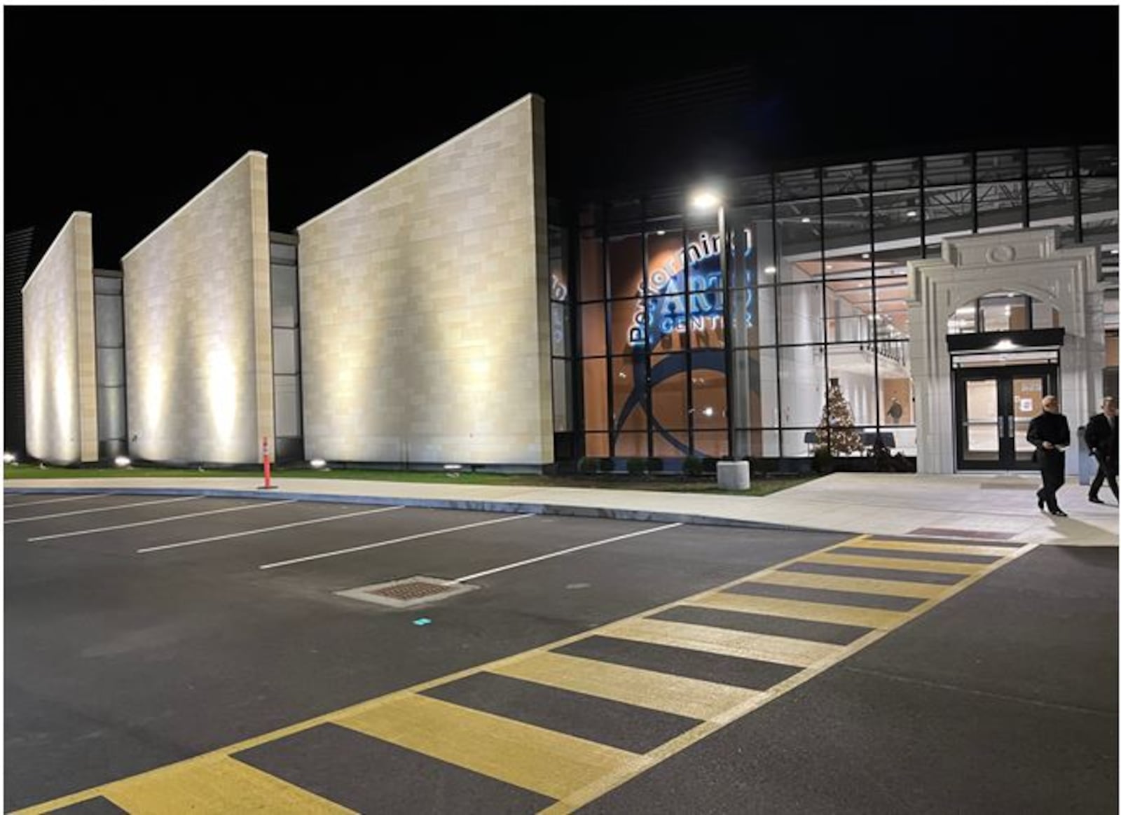 The front entrance into the Performing Arts Center is lit up following the open house event. The Wayne Local Schools said the new facility will be open for community gatherings and events. ED RICHTER/STAFF