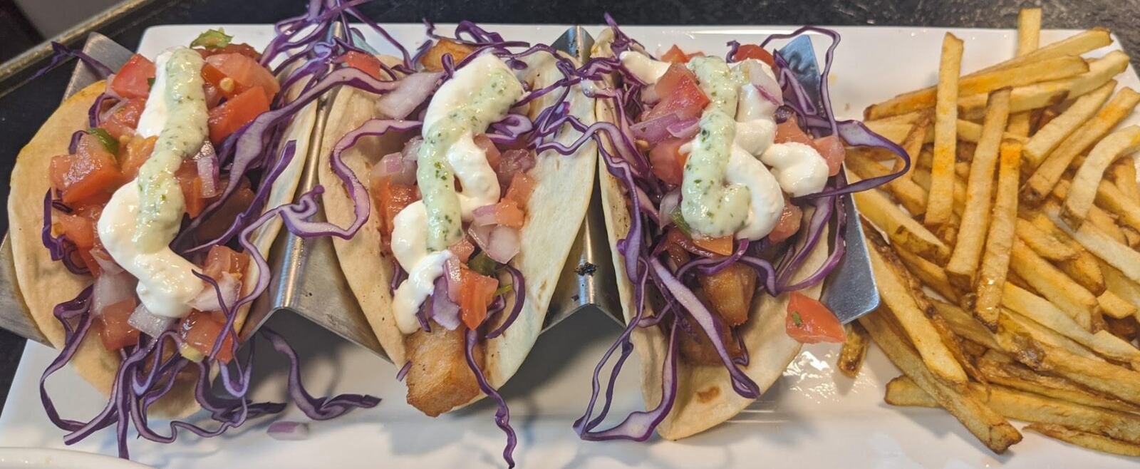 Hanks will serve special Bacon Week tacos with deep-fried pork belly, house-made pico de gallo, lime crema sauce, lime-cilantro dressing, and fresh shredded red cabbage, and served with a side. Bacon Week runs Aug. 15-22, 2020. CONTRIBUTED