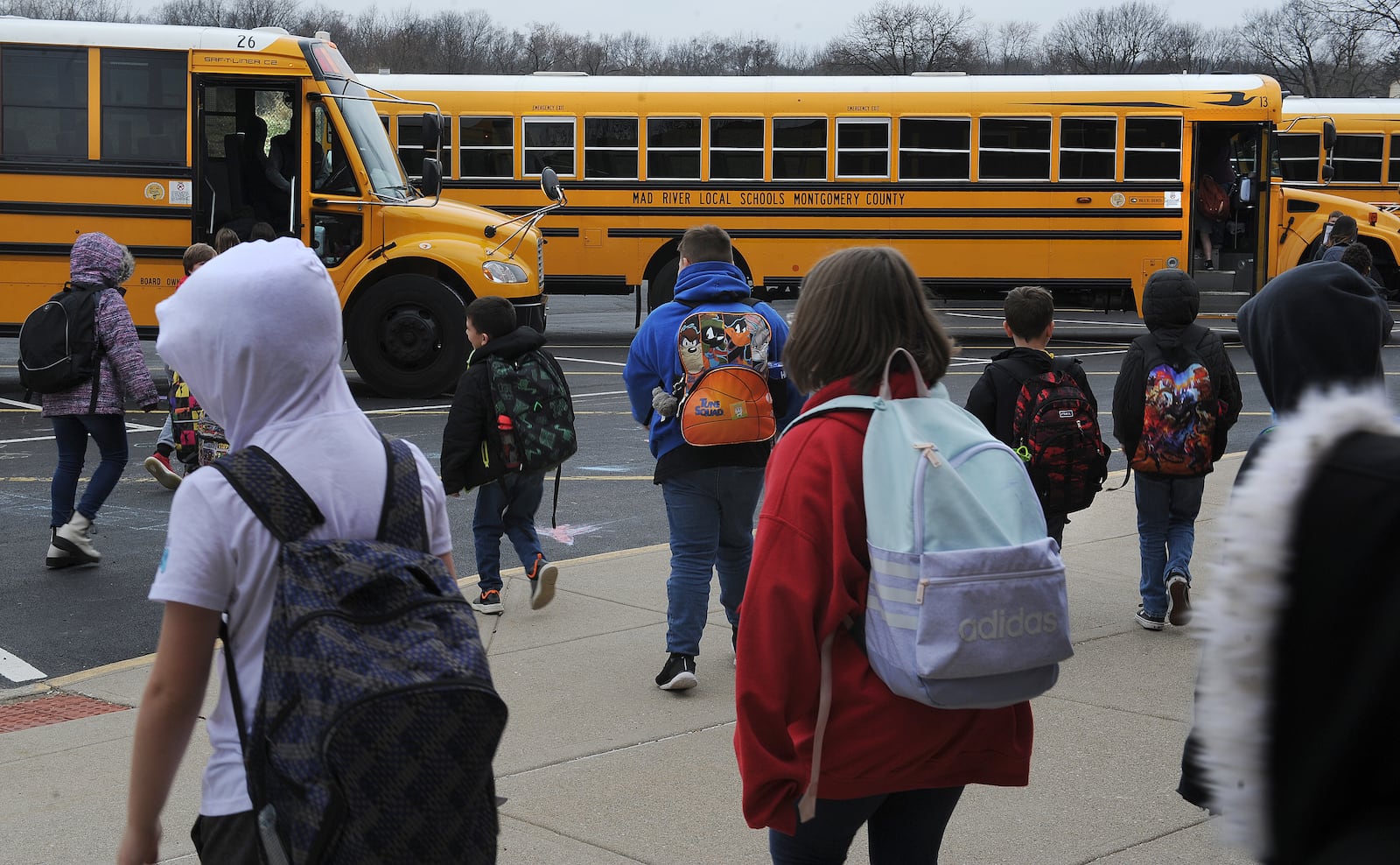 Students at Stevenson Elementary school head to the buses Friday March 11, 2022. MARSHALL GORBY\STAFF 