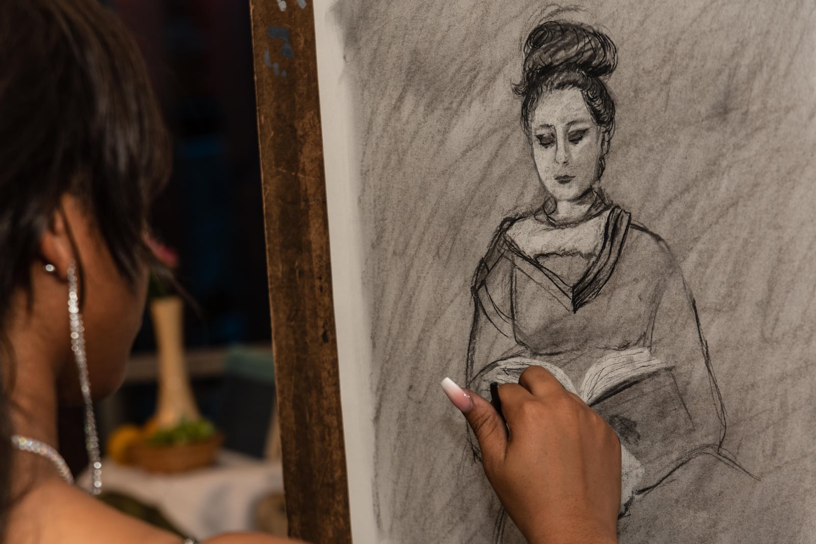 Artwork is created at Wright State University’s 24th annual ArtsGala, which was held at the WSU Creative Arts Center on Saturday, Apr. 1, 2023. TOM GILLIAM/CONTRIBUTING PHOTOGRAPHER