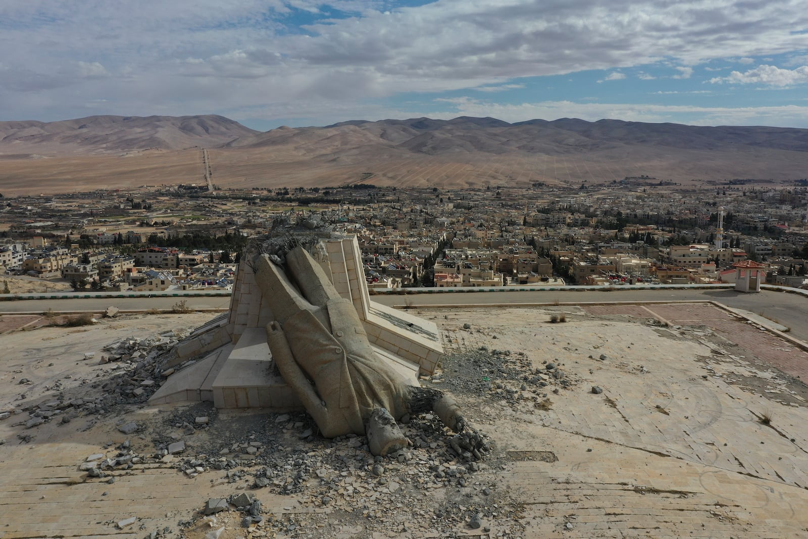 FILE - A statue depicting the late Syrian President Hafez Assad is seen on the top of a mount in Dayr Atiyah, Syria, Jan. 5, 2025. (AP Photo/Ghaith Alsayed, File)