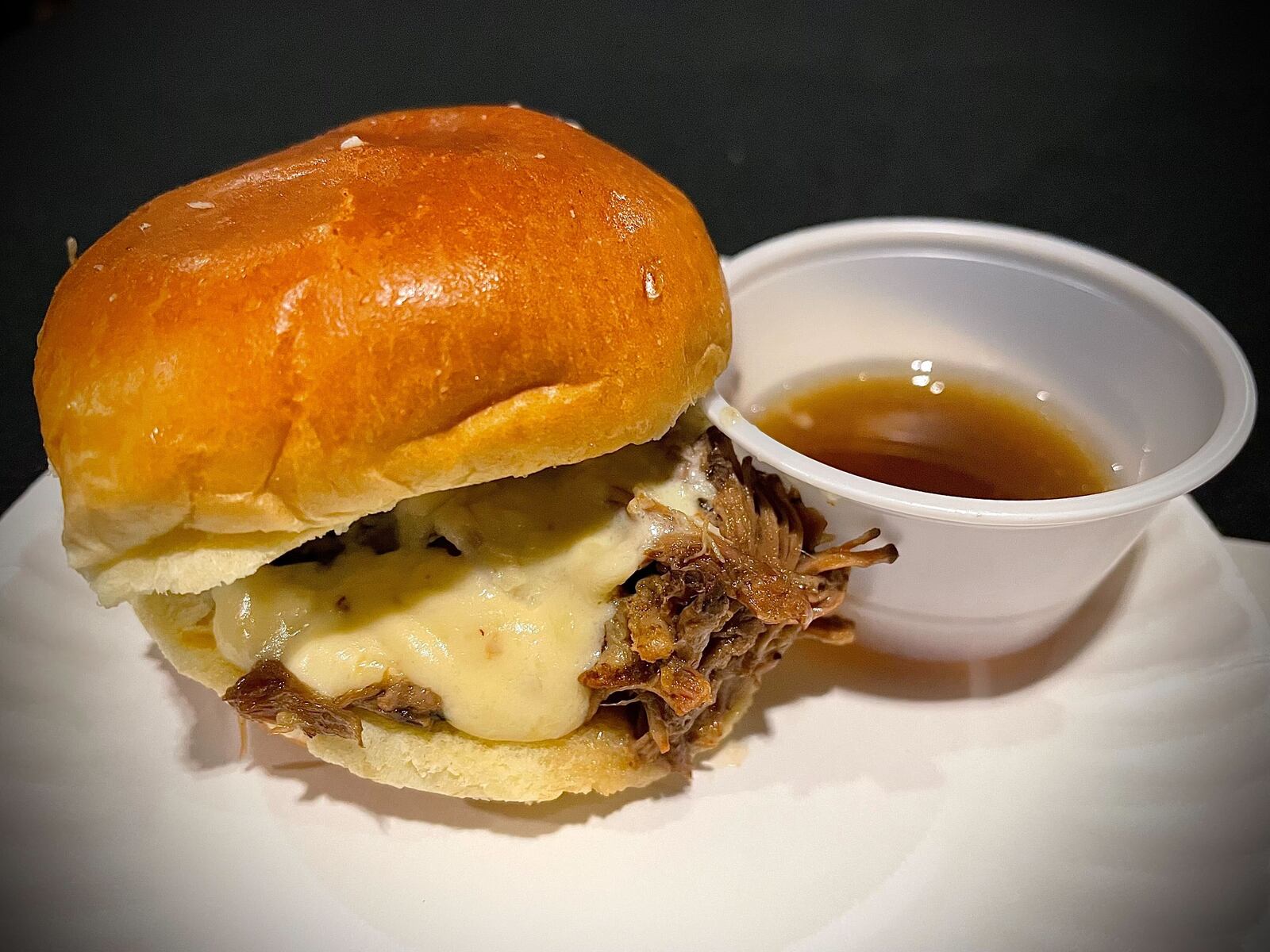 Sneak Peek to Winter Restaurant Week at the Steam Plant on Jan. 22, 2025 featured samples from 12 restaurants in the Dayton region. Pictured is a braised pulled beef slider from Crooked Handle Brewing Co. NATALIE JONES/STAFF