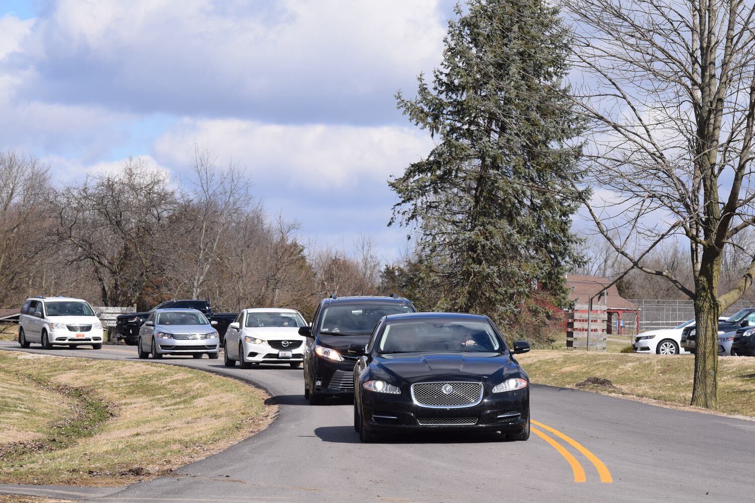 PHOTOS: Thousands of Outlaws attend motorcycle gang leaders funeral at Montgomery County Fairgrounds.