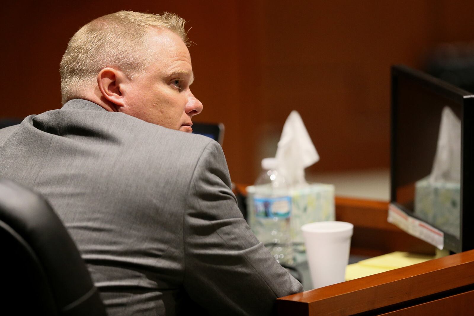 Assistant Warren County Prosecutor Steven Knippen listens to the police interview of Brooke "Skylar" Richardson, Thursday, Sept. 5, 2019, in Warren County Judge Donald Oda's II courtroom at Warren County Common Pleas Court in Lebanon, Ohio. Richardson, 20, is accused of killing and burying her baby in the backyard of her Carlisle home. Richardson is charged with aggravated murder, involuntary manslaughter, gross abuse of a corpse, tampering with evidence and child endangerment in the death of her newborn infant. She faces the possibility of life in prison. Kareem Elgazzar/The Enquirer/POOL