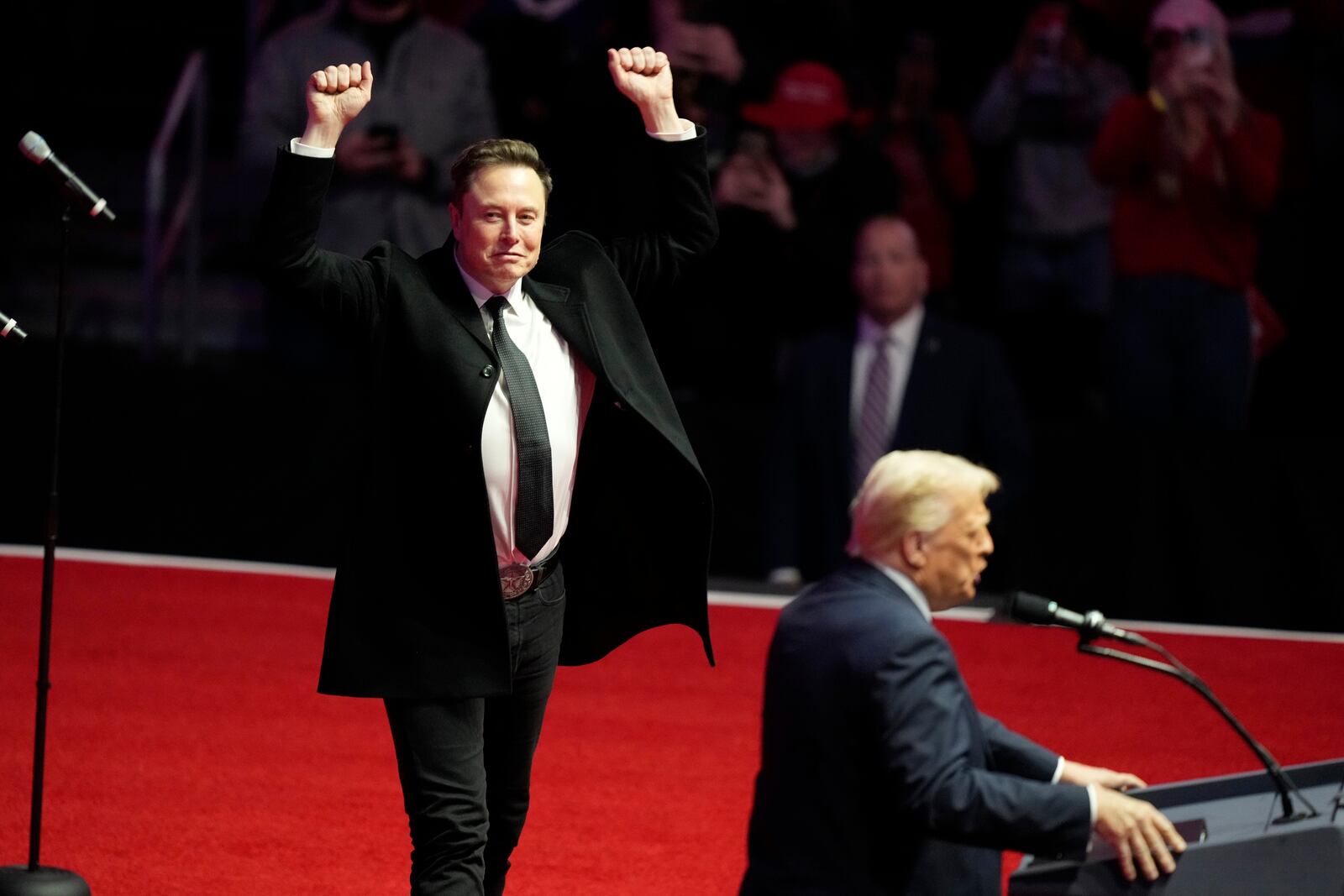 FILE - Elon Musk reacts as President-elect Donald Trump speaks at a rally ahead of the 60th Presidential Inauguration, Jan. 19, 2025, in Washington. (AP Photo/Alex Brandon, File)