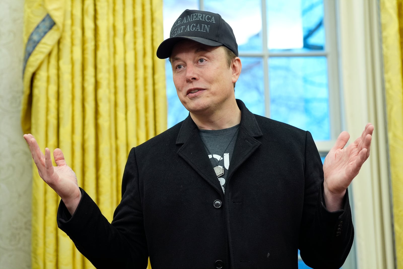 Elon Musk speaks during an event with President Donald Trump in the Oval Office at the White House, Tuesday, Feb. 11, 2025, in Washington. (Photo/Alex Brandon)