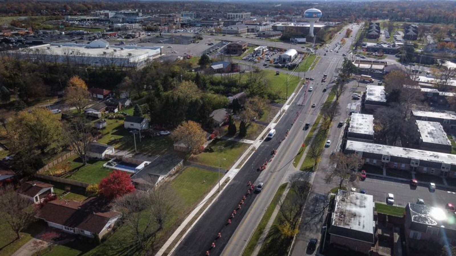 Final paving for the County Line Road widening project was completed this year for the road expansion  between Beavercreek and Kettering that began in June 2021. JIM NOELKER/STAFF