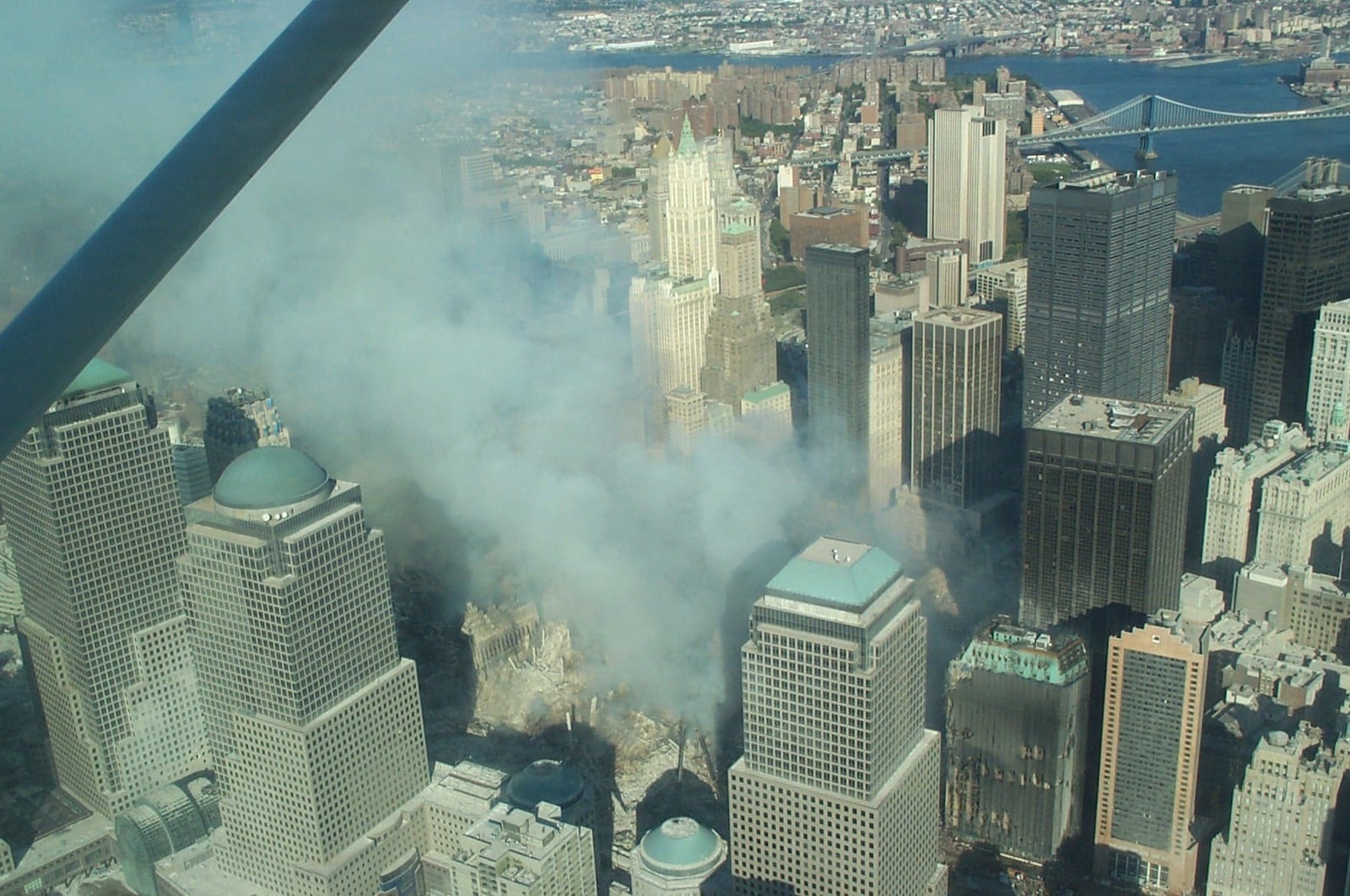 One of the photos showing the collapse of the World Trade Center, taken during the flight over New York City on September 12, 2001.