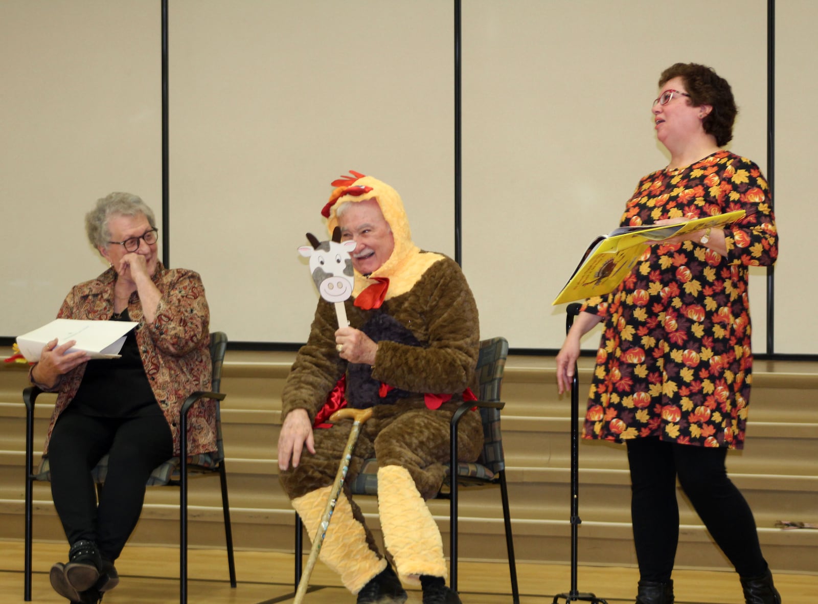 Robert Dillaplain (center) is a respected doctor and Air Force veteran, but he said to be a good school board member, you have to get in the school with the kids, as he did in November 2019 for a reading of the book "Turkey Trouble" with the students at Cox Elementary. CONTRIBUTED PHOTO