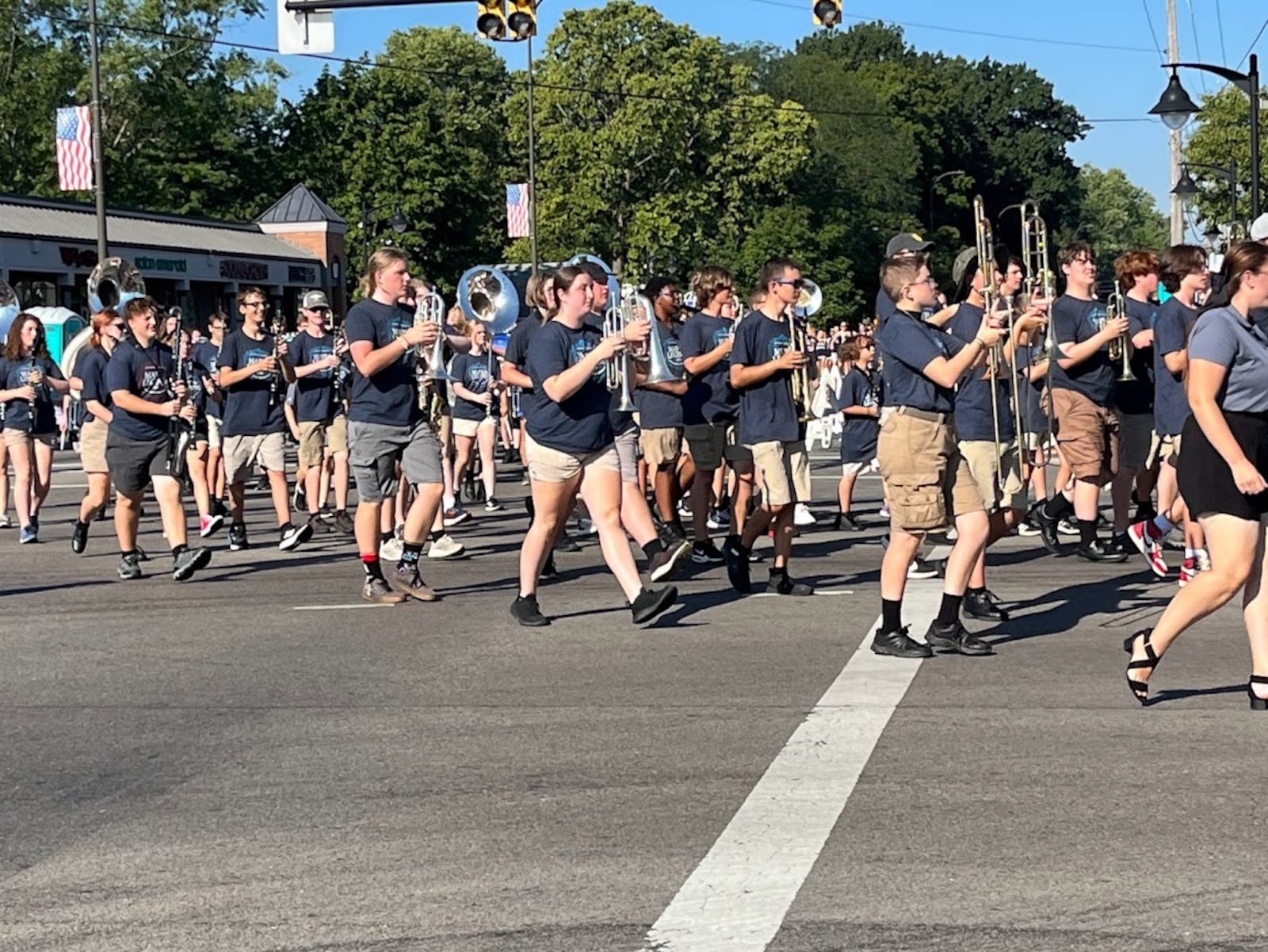 The Kettering Fairmont High School marching Firebirds, doing what they do at the Kettering "Holiday at Home" parade. THOMAS GNAU/STAFF