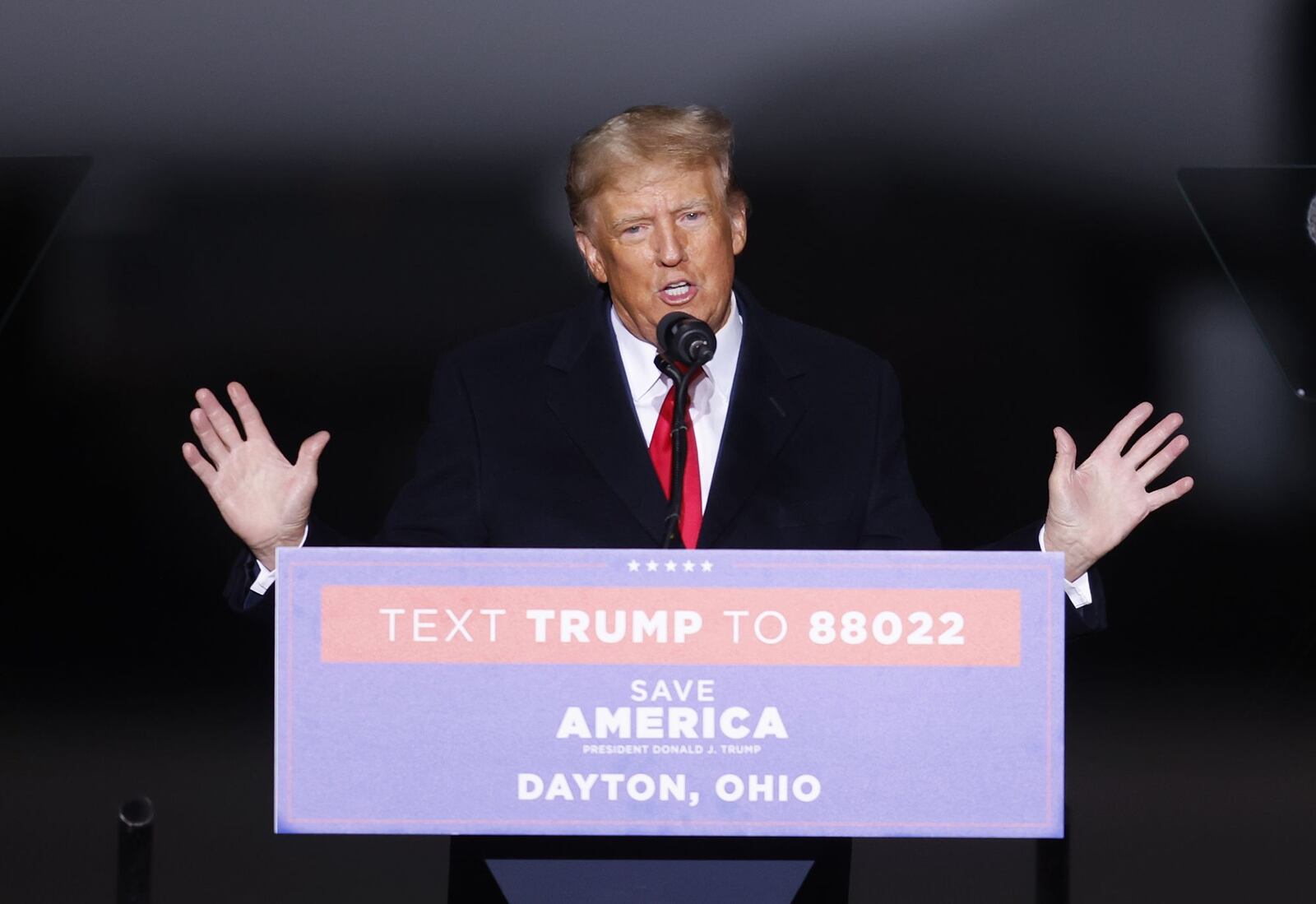 Donald Trump speaks to the crowd during rally Monday, Nov. 7, 2022 at Dayton International Airport. NICK GRAHAM/STAFF