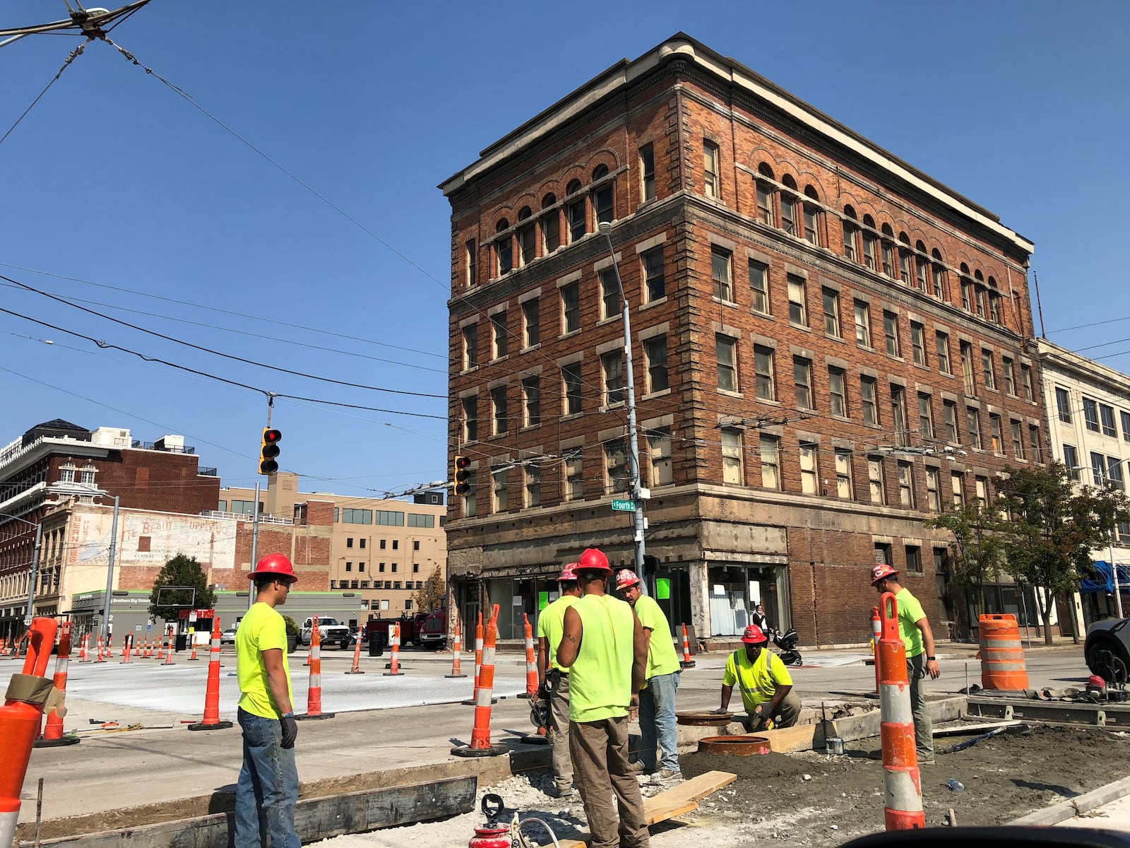 Crews work on East Fourth Street near the intersection of South Jefferson Street last year. CORNELIUS FROLIK / STAFF