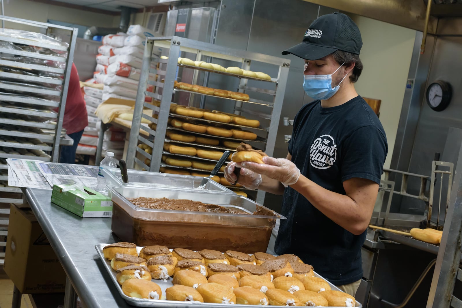 Happy National Doughnut Day! Here's a look behind-the-scenes of the donut making process at The Donut Haus Bakery in Springboro. TOM GILLIAM / CONTRIBUTING PHOTOGRAPHER