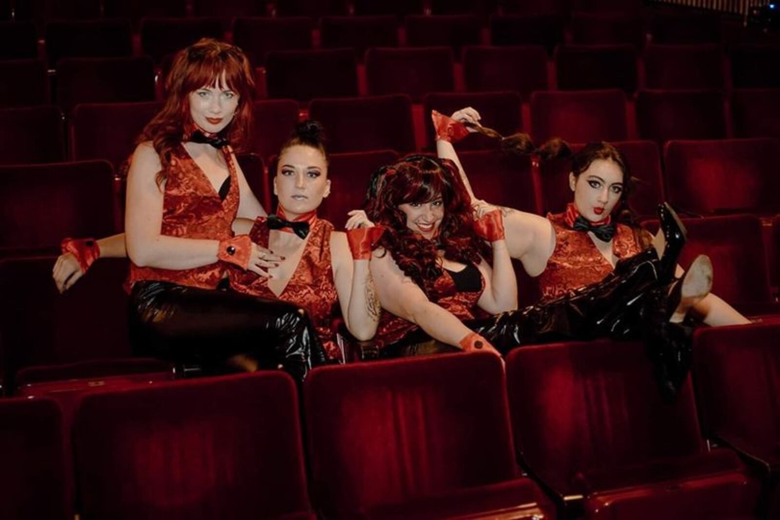 Left to right: Rachel Davis, Morgan Moad, Shana Fishbein and MacKenzie Randol as the Transylvanians of INNOVAtheatre's production of "The Rocky Horror Show," continuing through Oct. 30. PHOTO BY TAM PHOTOS 