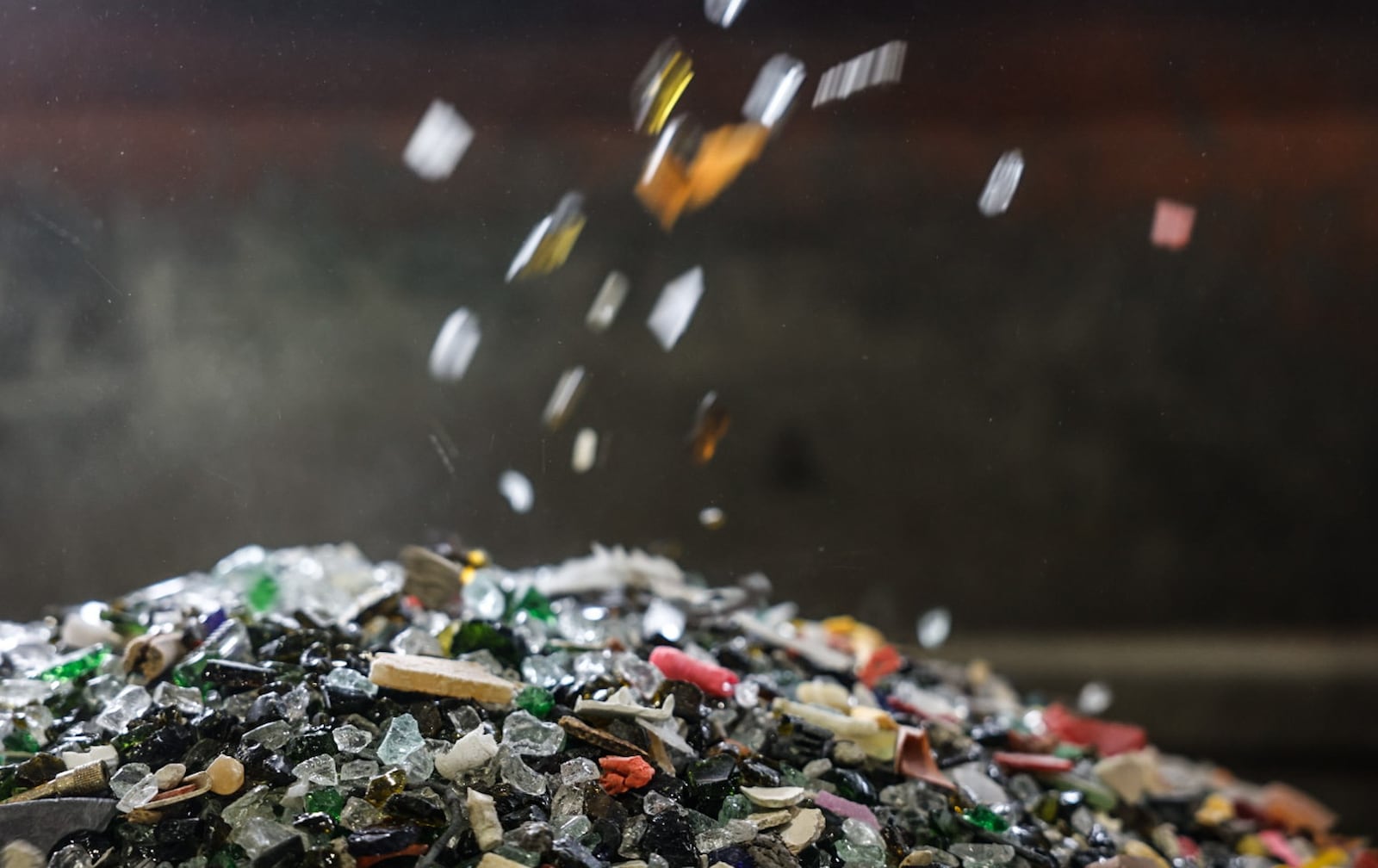 After running though crushers and large screening machines, recycled glass is used for insulation and reusable glass products. JIM NOELKER/STAFF