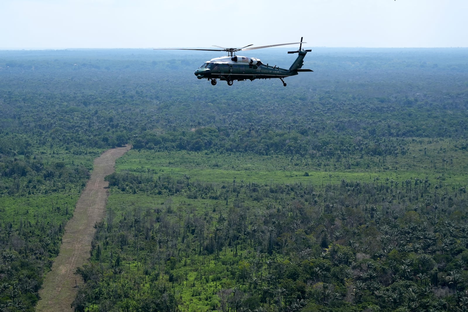 Marine One carrying President Joe Biden flies over the Amazon during a tour, Sunday, Nov. 17, 2024, in Manaus, Brazil. (AP Photo/Manuel Balce Ceneta)