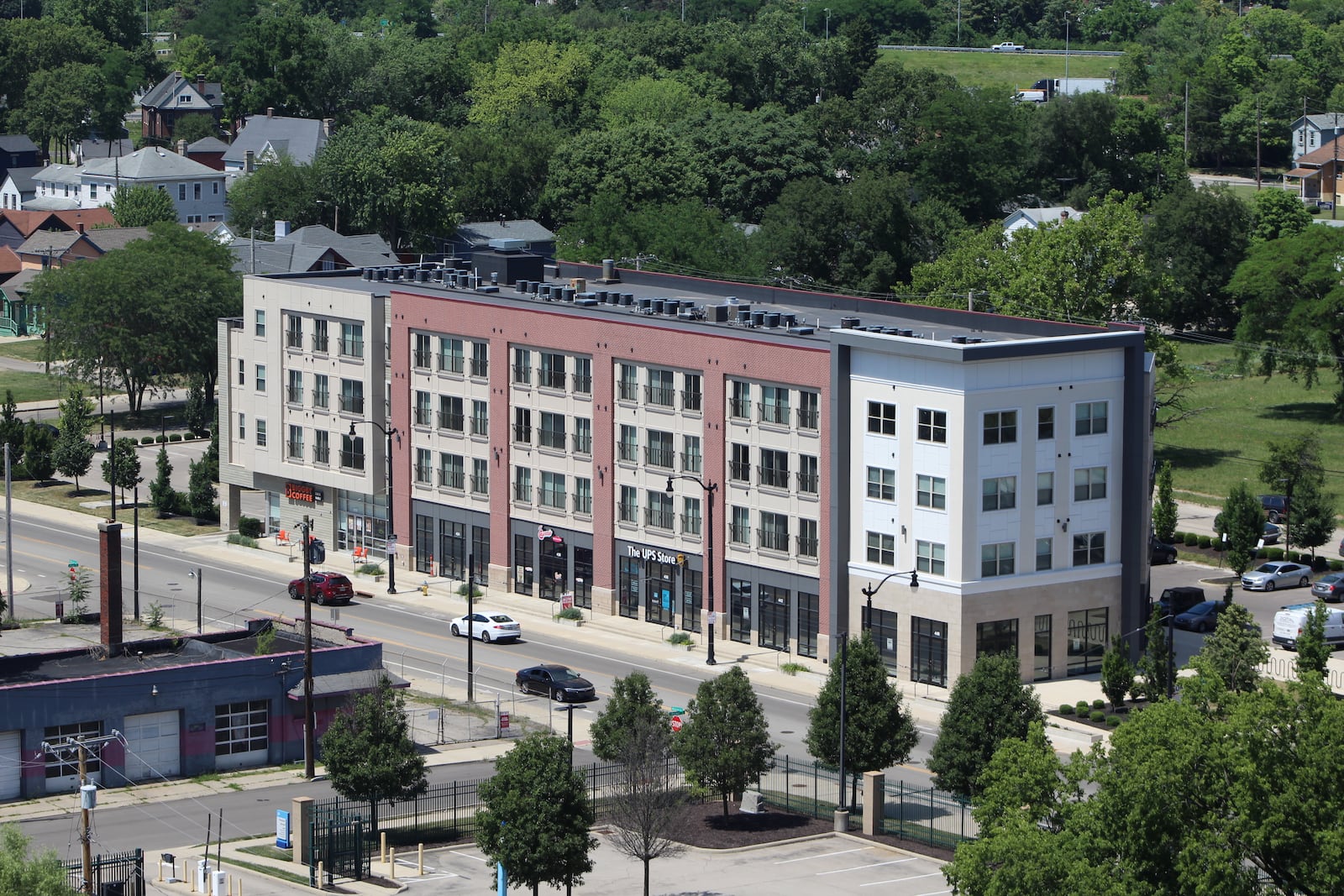 The first phase of the Flats at South Park project. This four-story apartment building opened in early 2018. A second, similar building (phase 2) opened just south of this building in late 2021. The developer now plans to build new flats, townhouses and single-family homes on land just east of this in the South Park neighborhood. CORNELIUS FROLIK / STAFF