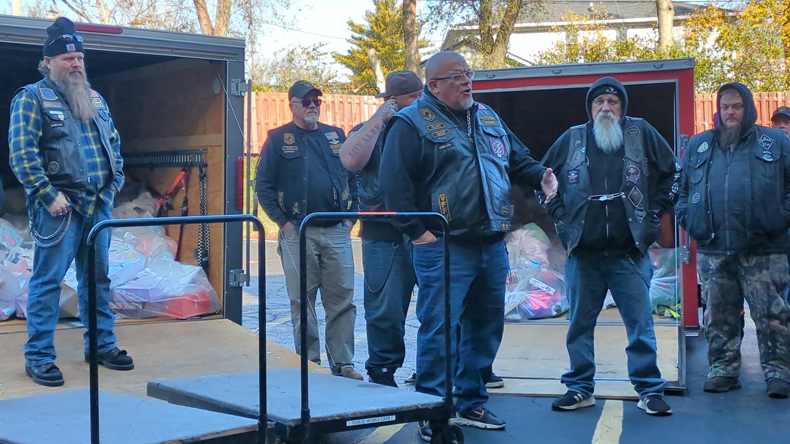 Keith "Elmo" Tickle, of Dayton and the U.S. Veterans Motorcycle Club, addresses members of the Ohio State Coalition of Clubs (Ohio State COC) after they deliver more than $10,000 in holiday presents to Montgomery County Children Services on Sunday, Dec. 1. Caseworkers will distribute gifts to children of all ages who are in Montgomery County’s care during the holidays. SAM WILDOW/STAFF