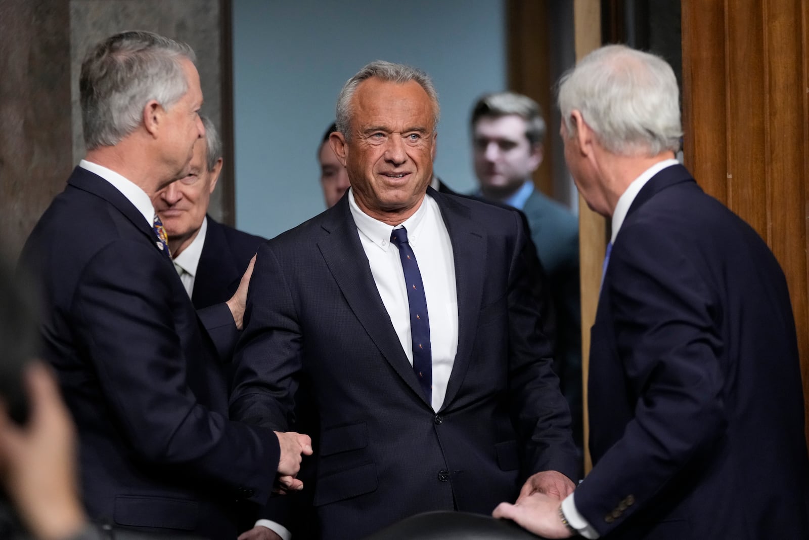 Robert F. Kennedy Jr., President Donald Trump's choice to be Secretary of Health and Human Services, arrives to appear before the Senate Finance Committee for his confirmation hearing, at the Capitol in Washington, Wednesday, Jan. 29, 2025. (AP Photo/Ben Curtis)