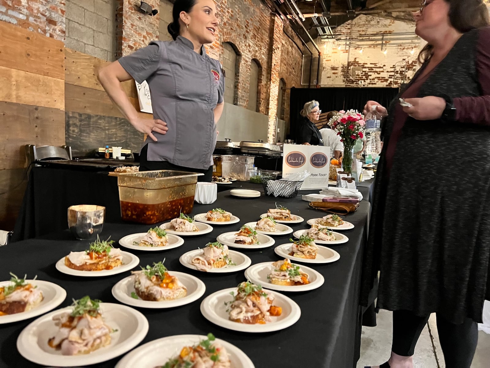 Katy Evans, Executive Chef of Coldwater Cafe participates in the Diced Dayton Chefs Challenge at the Brightside Music Venue - her first dish is seen her. She calls it 'Pork Toast.'