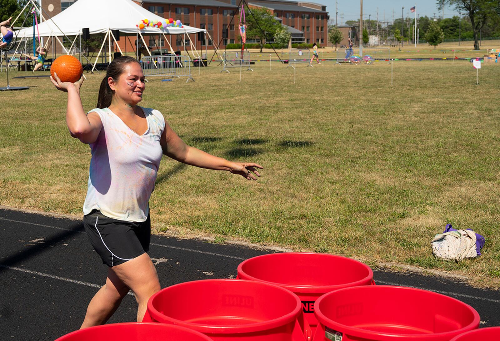 Kelly Kaleda, an Air Force Research Laboratory civilian employee, plays in a game of giant pong at Colorfest on June 30 at Wright-Patterson Air Force Base. The party was the closing event for Wright-Patt’s Pride Month observance. U.S. AIR FORCE PHOTO/R.J. ORIEZ