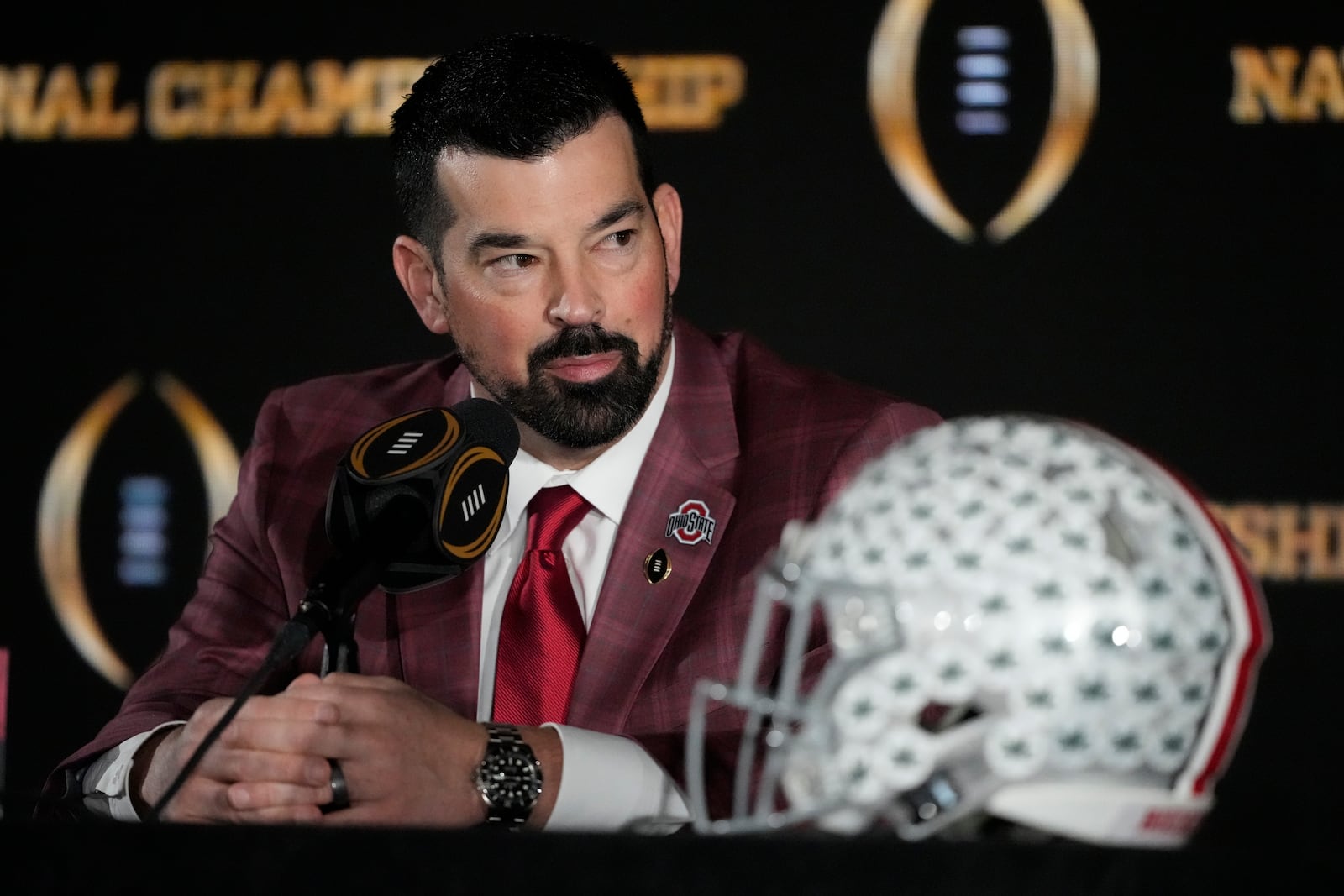 Ohio State head coach Ryan Day speaks during a news conference ahead of the College Football Playoff national championship game Sunday, Jan. 19, 2025, in Atlanta. The game between Ohio State and Notre Dame will be played on Monday. (AP Photo/Chris Carlson)