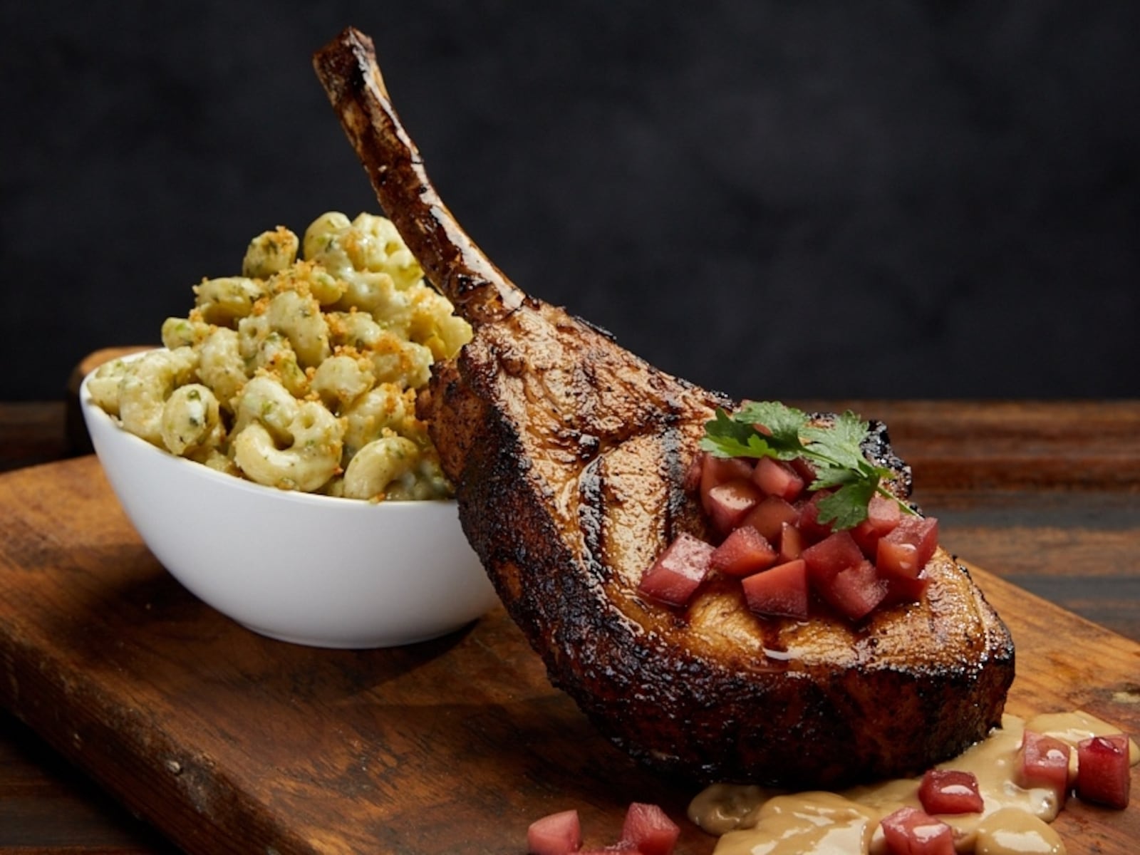 Winter Restaurant Week 2023 - Firebirds Tomahawk Pork Chop