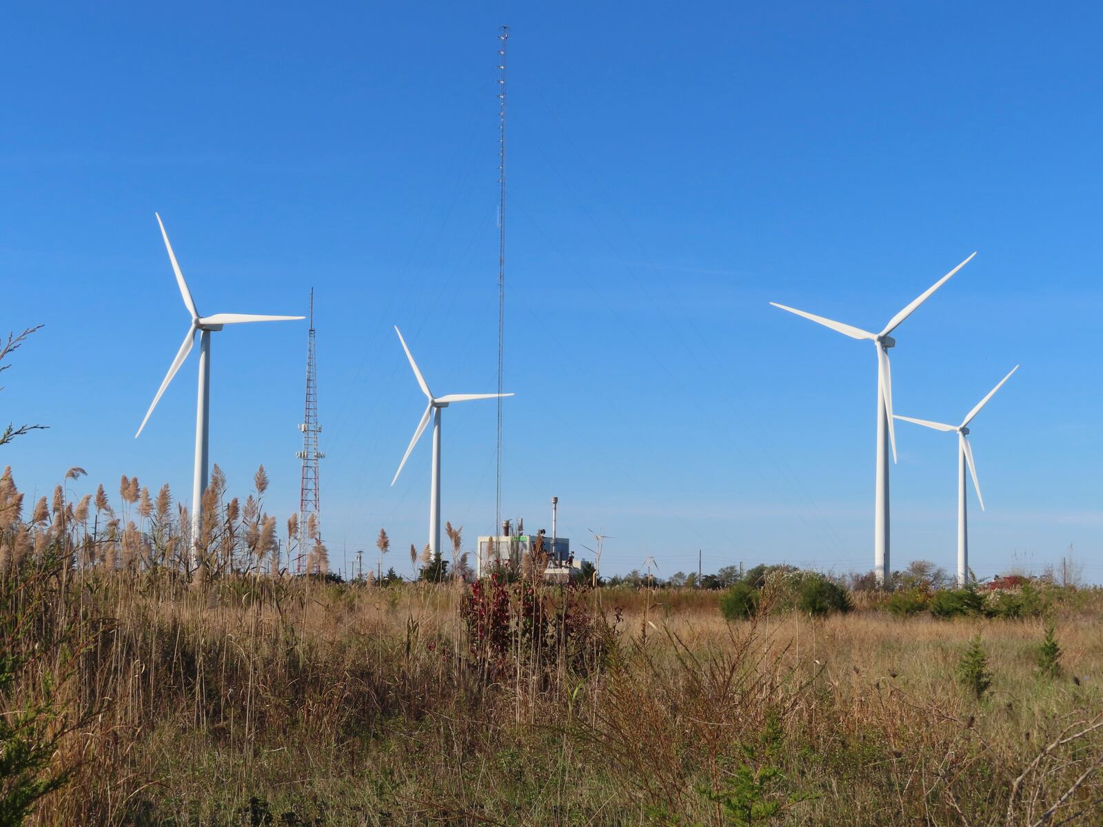 Land-based wind turbines spin in Atlantic City, N.J., on Nov. 3, 2023. (AP Photo/Wayne Parry)