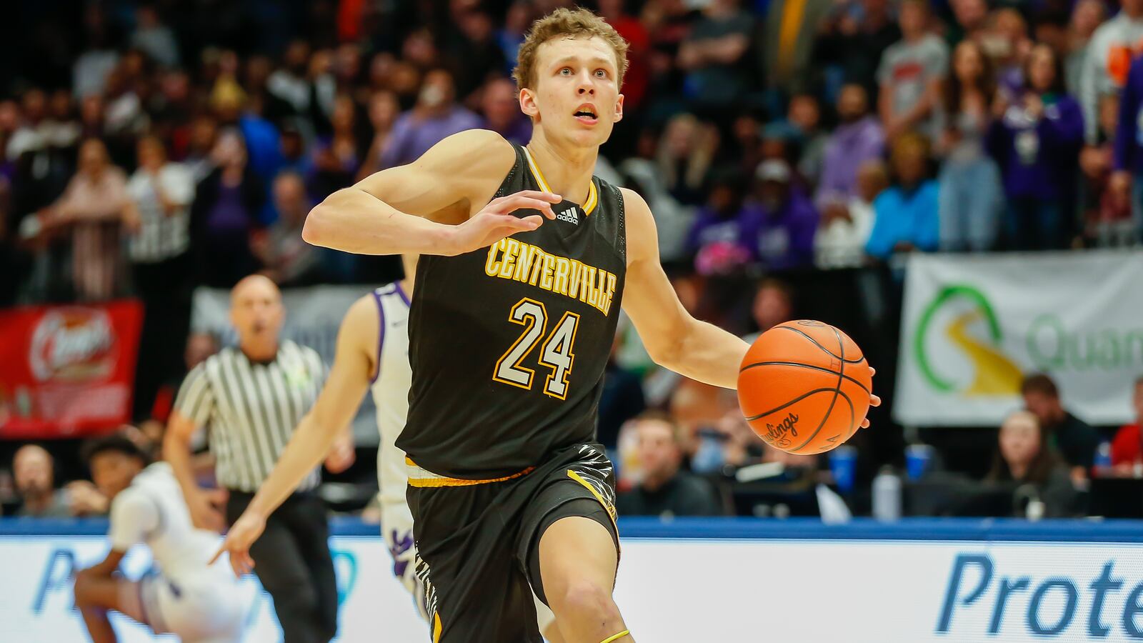 Centerville's Rich Rolf eyes the basket during Sunday's Division I state championship game at UD Arena. Michael Cooper/CONTRIBUTED