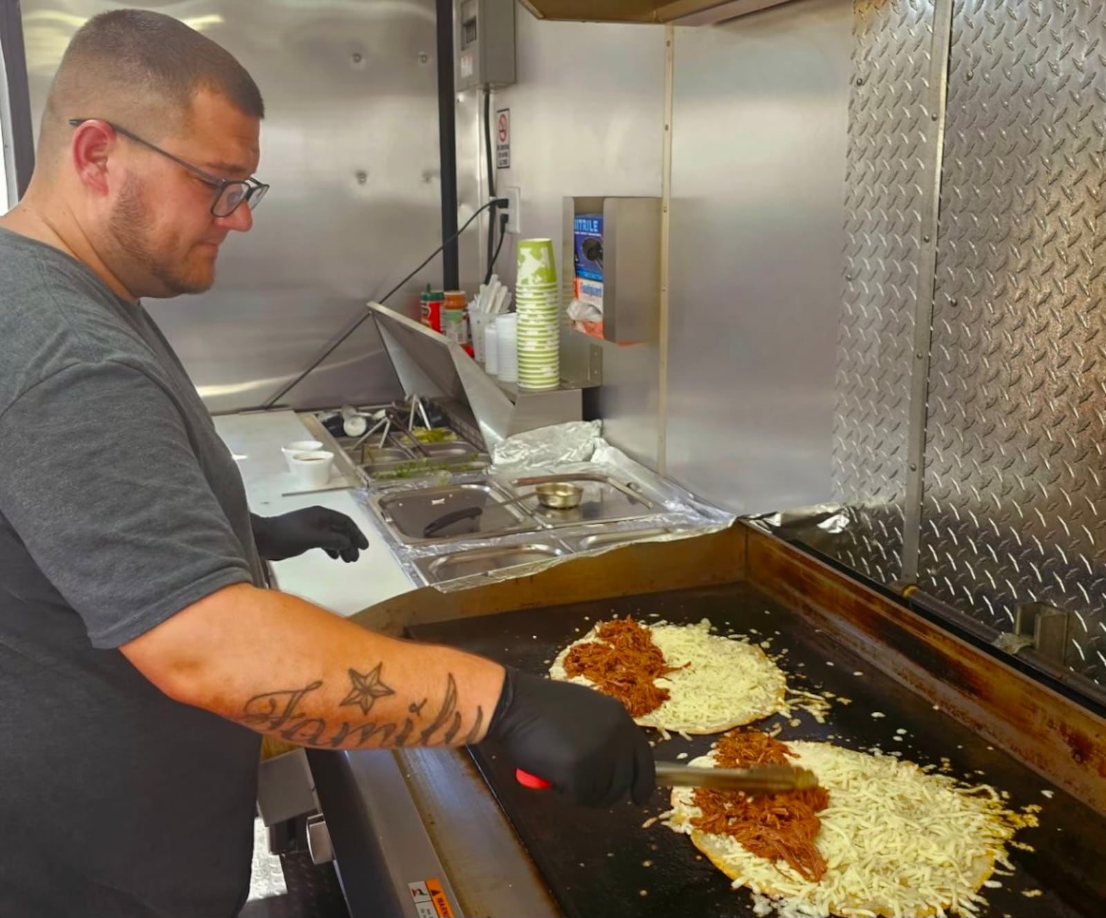 Every Tuesday It’s All Good features birria-inspired items like tacos, quesadillas, bowls, burritos and ramen noodles. Pictured is owner Alex Achs (CONTRIBUTED PHOTO).