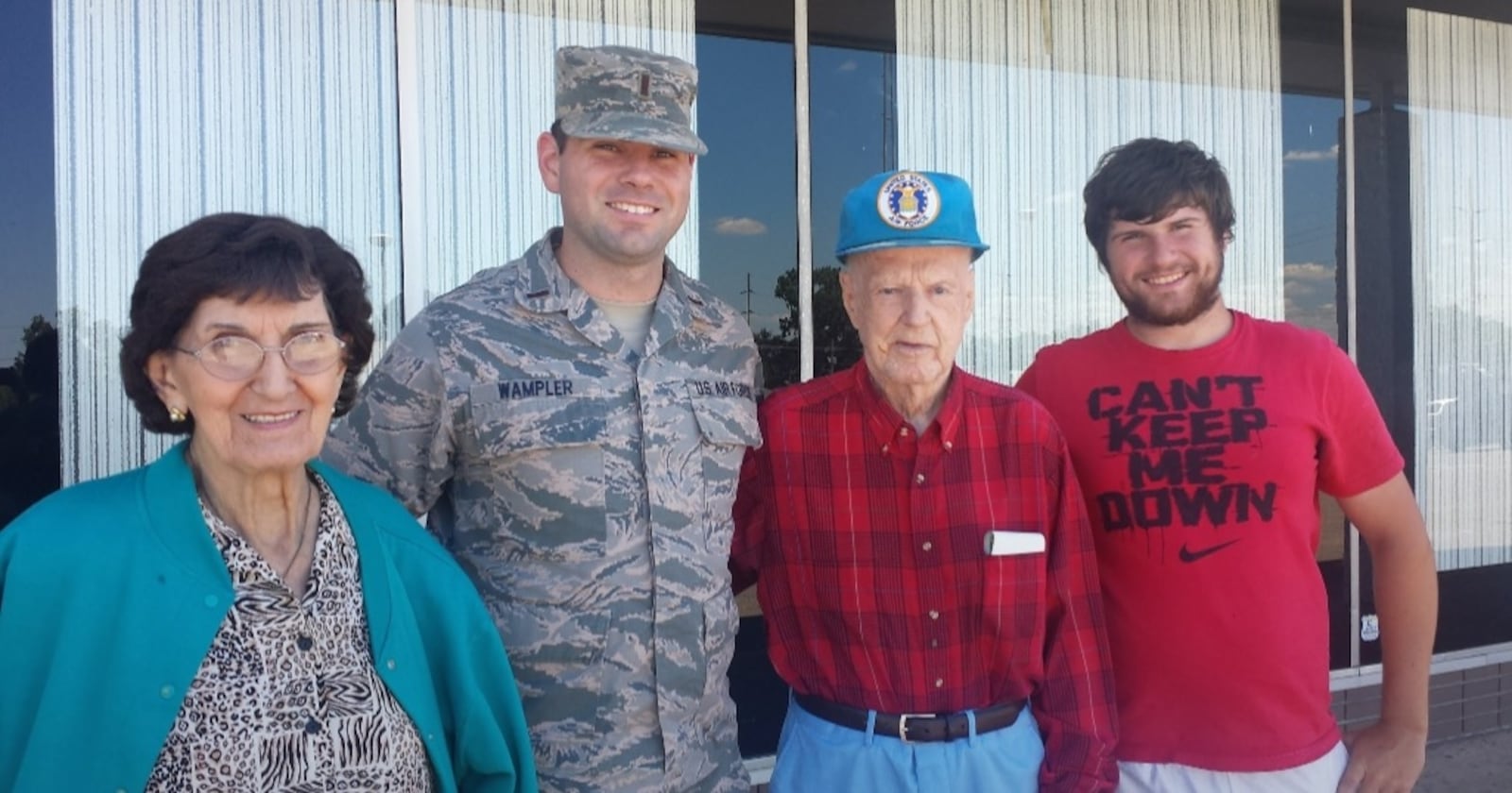 Karen Wampler's parents, Joe and Rosemary Ferguson, standing outside Clancy's with their Grandsons Sean Wampler (in fatigues) and Kyle Wampler. (CONTRIBUTED)