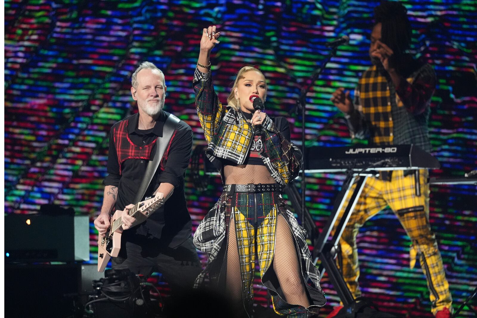 Tom Dumont, left, and Gwen Stefani of No Doubt perform during the FireAid benefit concert on Thursday, Jan. 30, 2025, at The Forum in Inglewood, Calif. (AP Photo/Chris Pizzello)