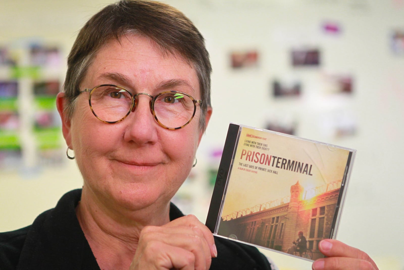 Yellow Springs resident, WSU film professor, film maker Julia Reichert holds a DVD of the Academy Award nominated (in the short documentary category) for her role as an associate producer for an HBO documentary called Prison Terminal of which she was an associate producer. JIM WITMER / STAFF