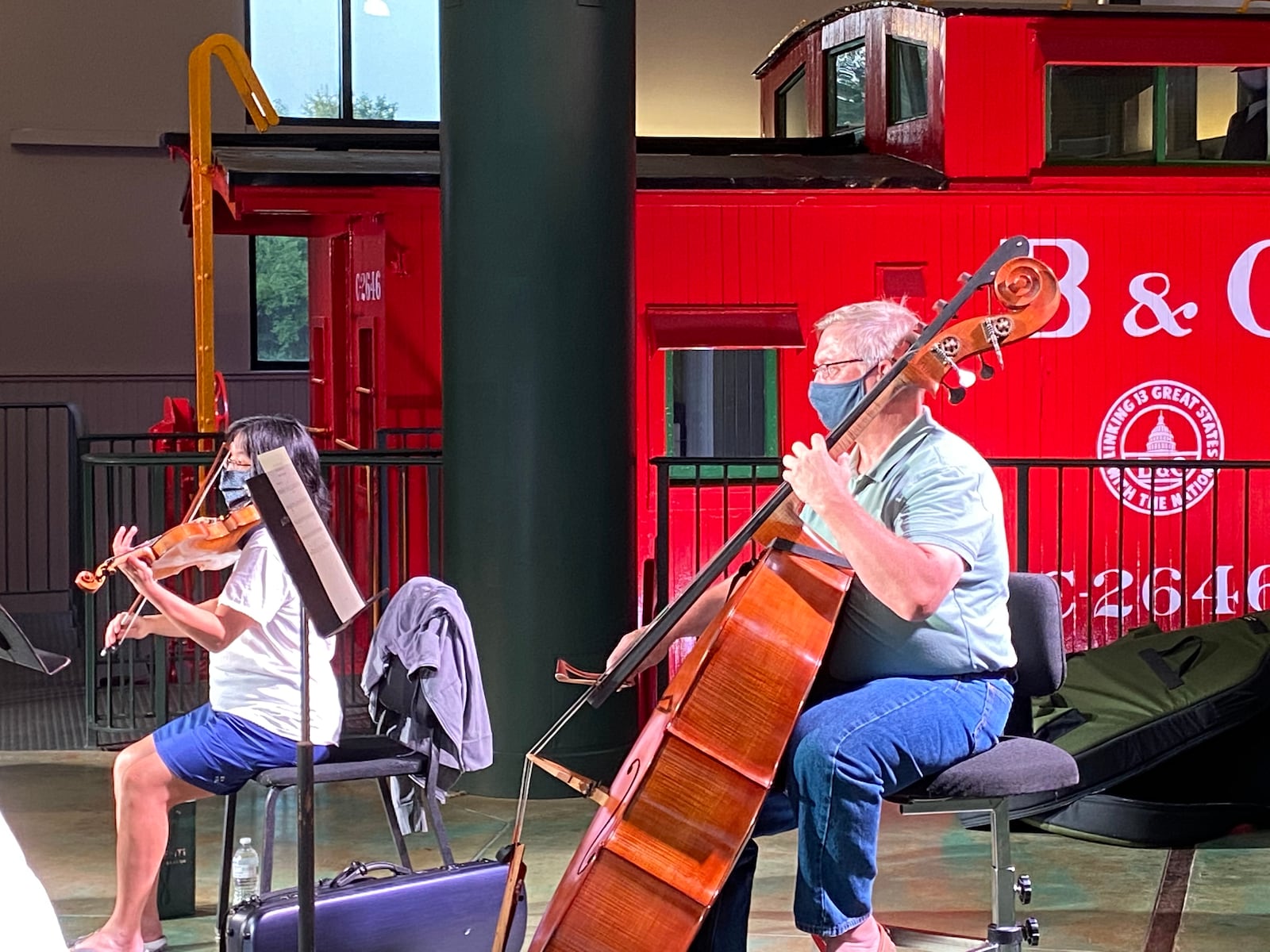 Violinist Ann Lin Baer and Bassist John Pascolini rehearse at the James F. Dicke Family Transportation Center for the upcoming DPAA concert A Celebration from Carillon Historical Park. CONTRIBUTED