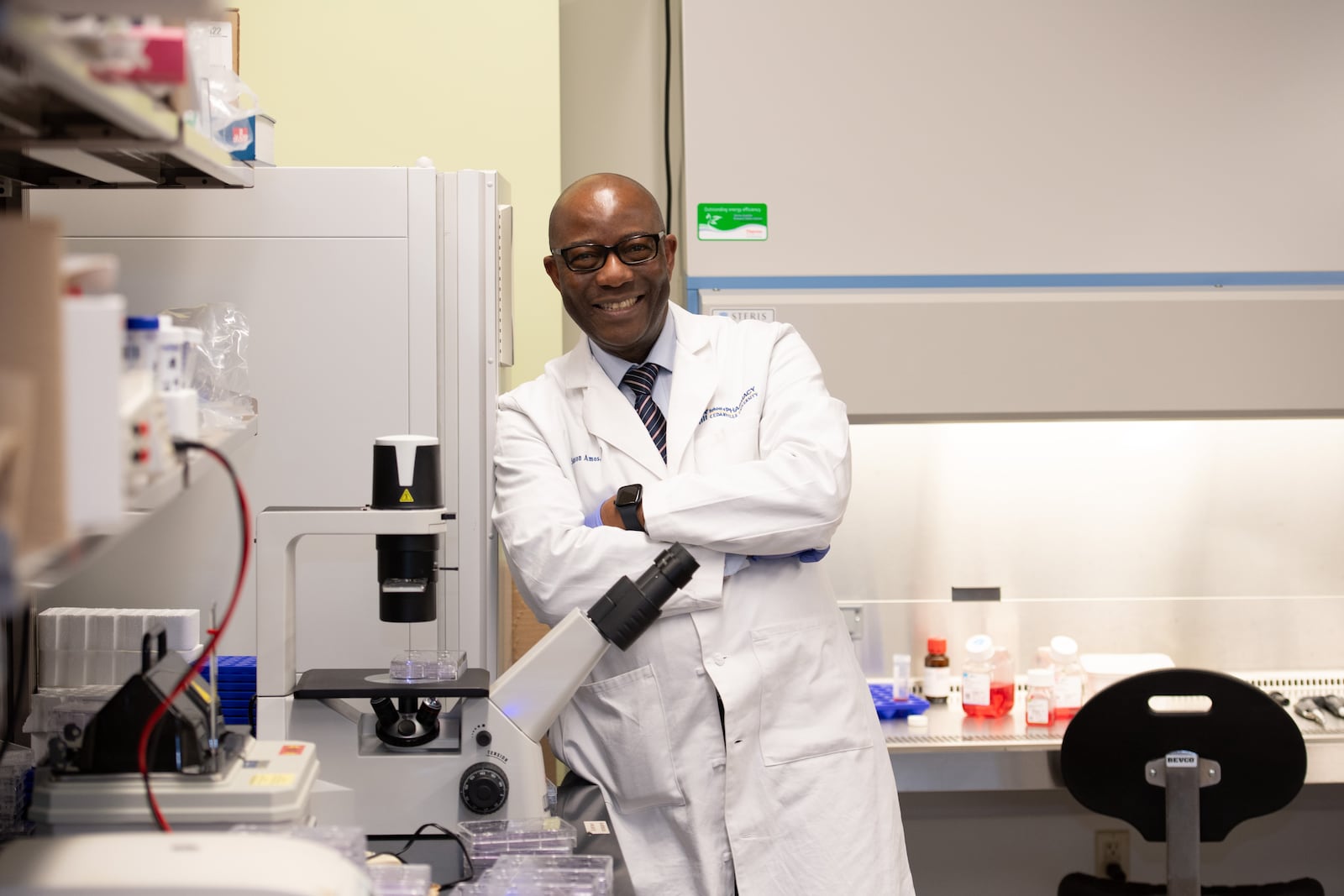 Dr. Samson Amos, chair and associate professor of pharmaceutical sciences at Cedarville University, in a laboratory at the university. SCOTT HUCK/CEDARVILLE UNIVERSITY