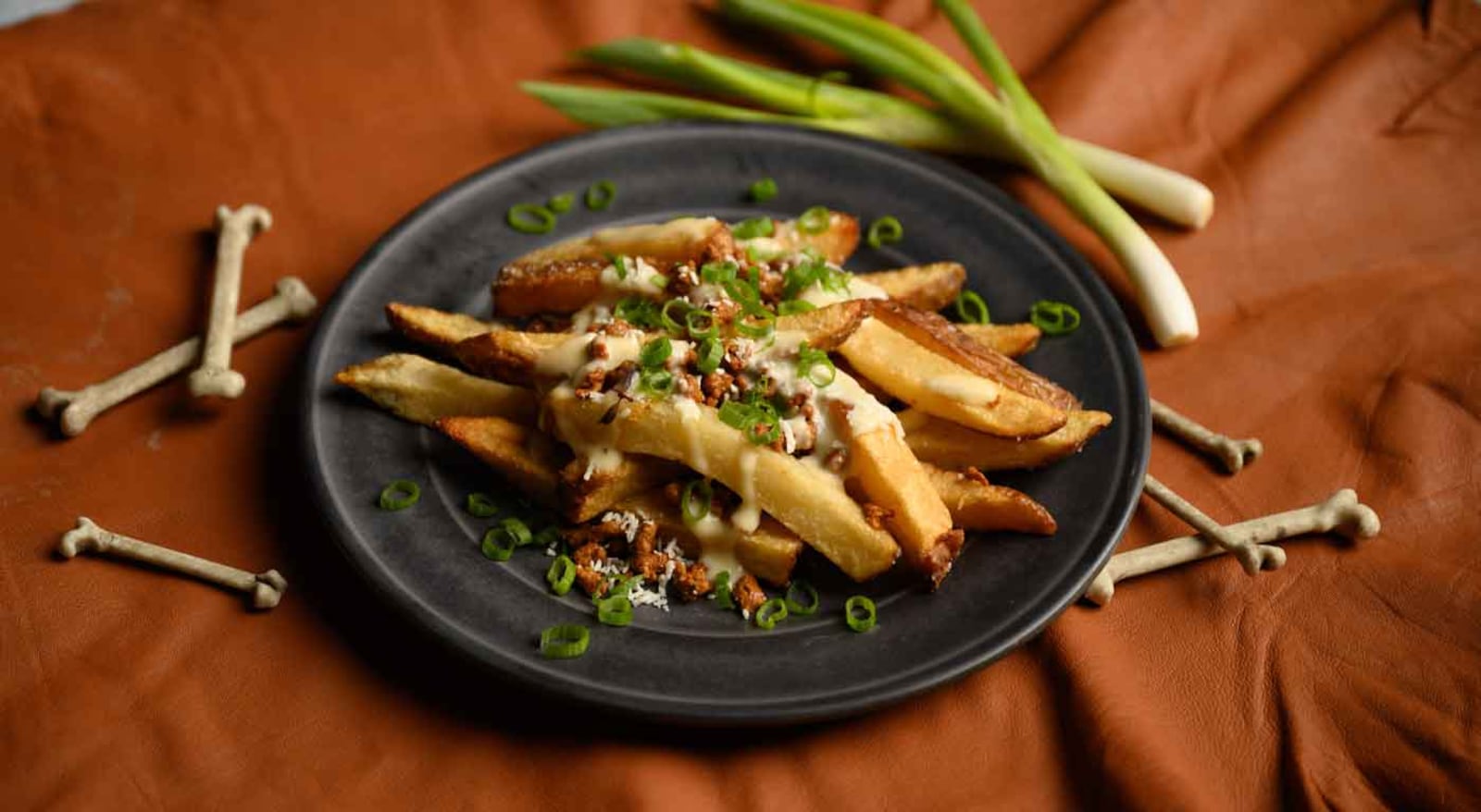 Kings Island's 2020 “Tricks and Treats” festival offers new food experiences like this "zombie poutine" with a tasting pass for different tricks and treats around the park. A “tasting card” allows for six food tastings of your choice from a dozen tricks and a dozen treats. CONTRIBUTED