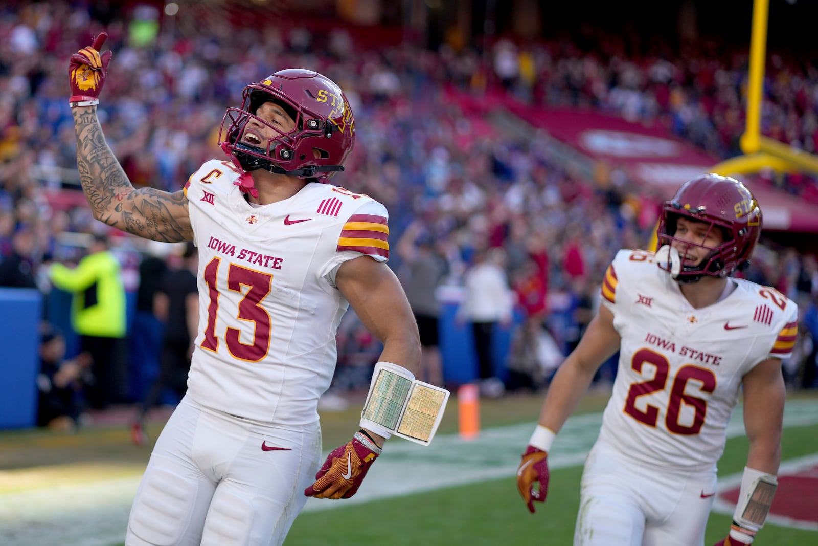 Iowa State wide receiver Jaylin Noel (13) celebrates after scoring a touchdown during the first half of an NCAA college football game against Kansas Saturday, Nov. 9, 2024, in Kansas City, Mo. (AP Photo/Charlie Riedel)