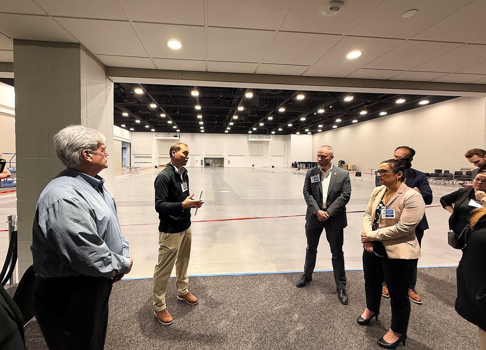 Jonathan Boeckling, project executive with Messer, gives a tour of the renovated Dayton Convention Center. About $45 million worth of renovations to the downtown facility are nearly complete. CORNELIUS FROLIK / STAFF