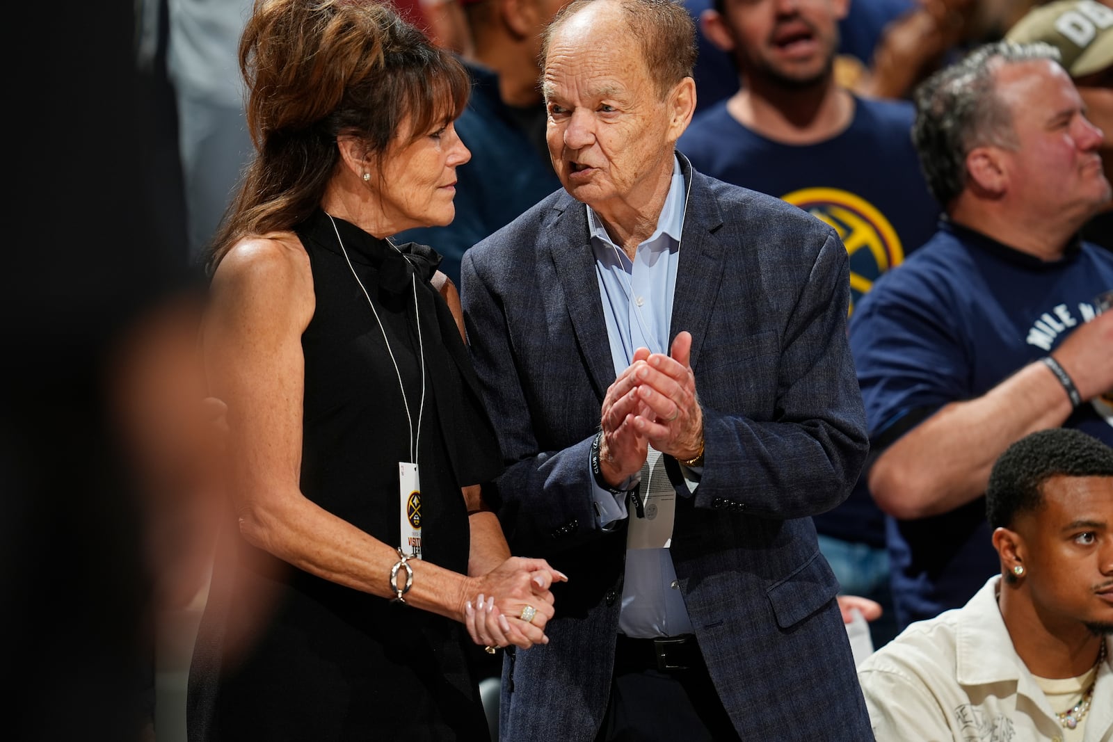 FILE - Minnesota Timberwolves owner Glen Taylor chats with his wife, Becky, in the second half of Game 1 of an NBA basketball second-round playoff series, May 4, 2024, in Denver. (AP Photo/David Zalubowski, File)