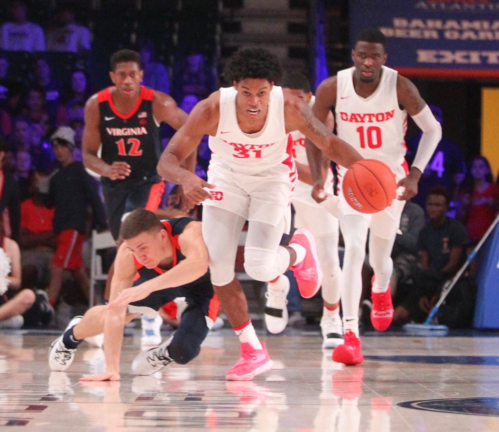 Dayton’s Jhery Matos dribbles against Virginia in the semifinals of the Battle 4 Atlantis on Thursday, Nov. 22, 2018, at Imperial Gym on Paradise Island, Bahamas. David Jablonski/Staff