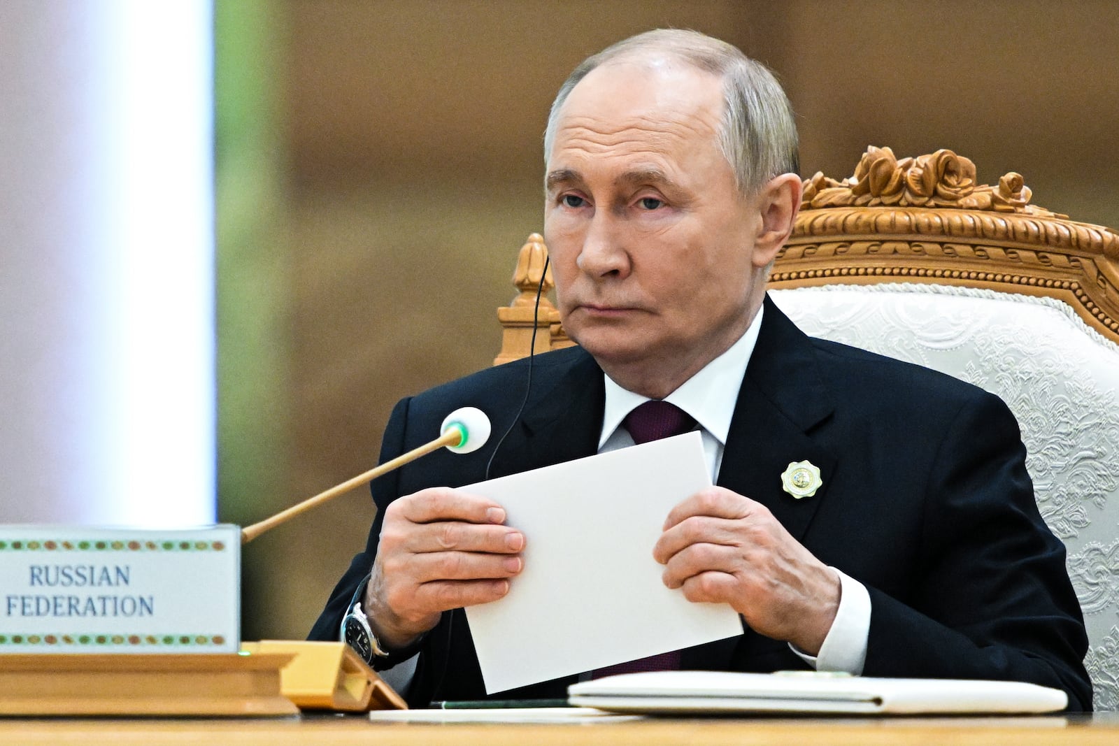 Russian President Vladimir Putin attends the International Forum "The Interconnection of Times and Civilizations – the basis of peace and development" dedicated to the 300th anniversary of the birth of the outstanding Turkmen poet and thinker Magtymguly Fragi in Ashgabat, Turkmenistan, Friday, Oct. 11, 2024. (Sergei Bobylev, Sputnik, Kremlin Pool Photo via AP)