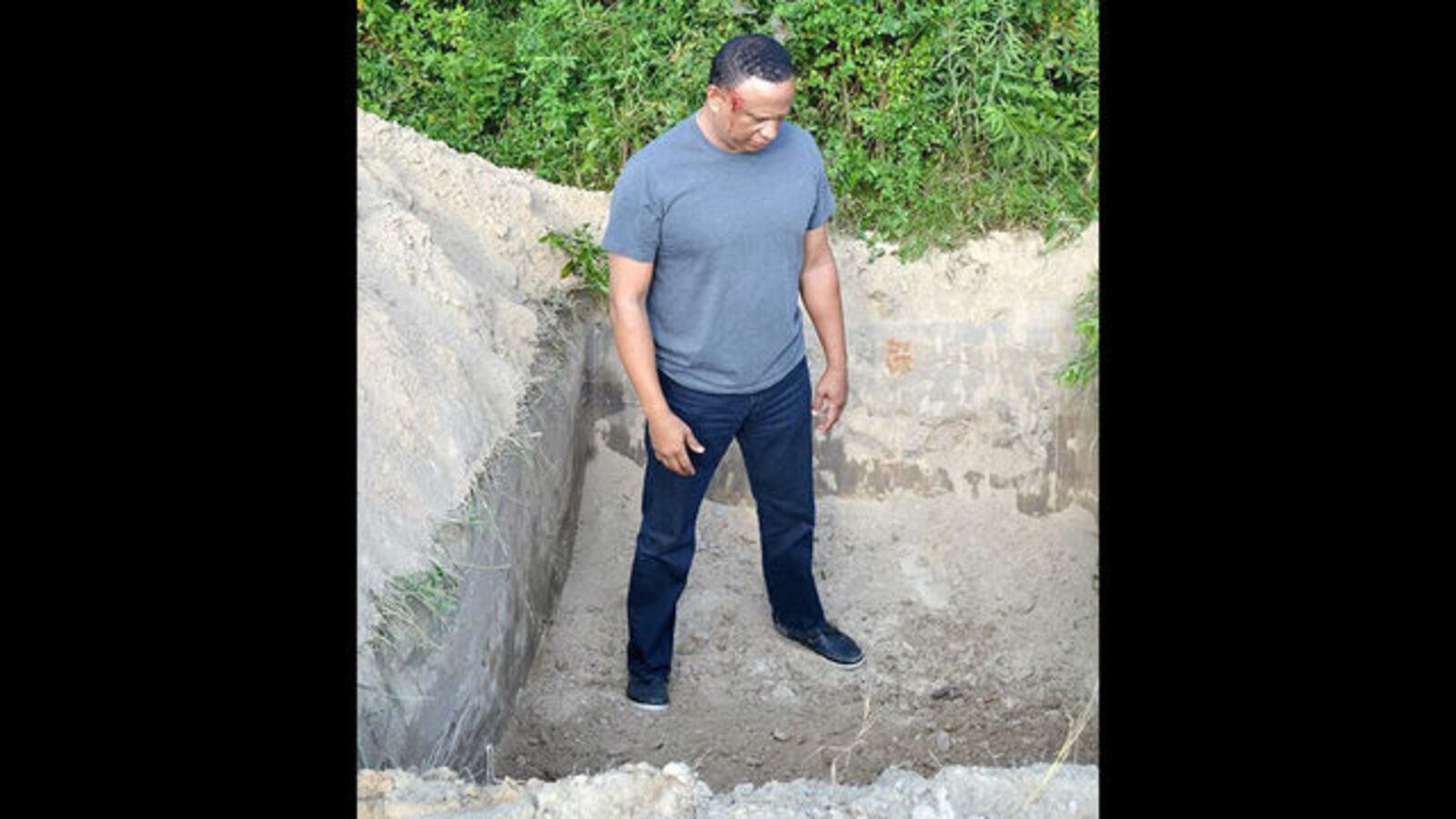 Ramon Sosa is pictured standing in the fake grave police dug for him in 2015. His ex-wife, Maria "Lulu" Sosa, 45, of Spring, Texas, is serving up to 20 years in prison for trying to hire a hit man to kill her husband during an acrimonious divorce.