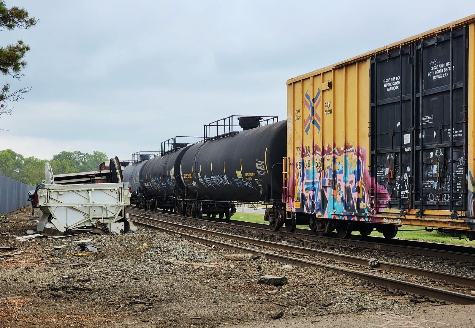 A semi tractor trailer was struck by a train on tracks at a crossing at  at Woodlawn Avenue and University Boulevard in Middletown Sept. 7, 2023. No one was injured. NICK GRAHAM/STAFF