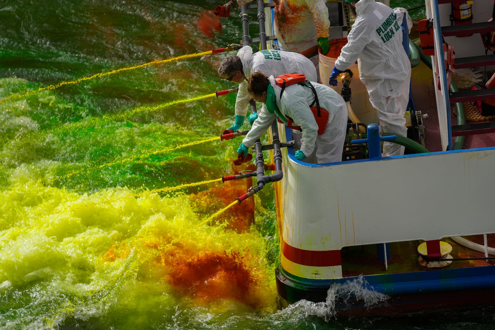 The Chicago River is dyed green as part of annual St. Patrick's Day festivities Saturday, March 15, 2025, in Chicago. (AP Photo/Erin Hooley)