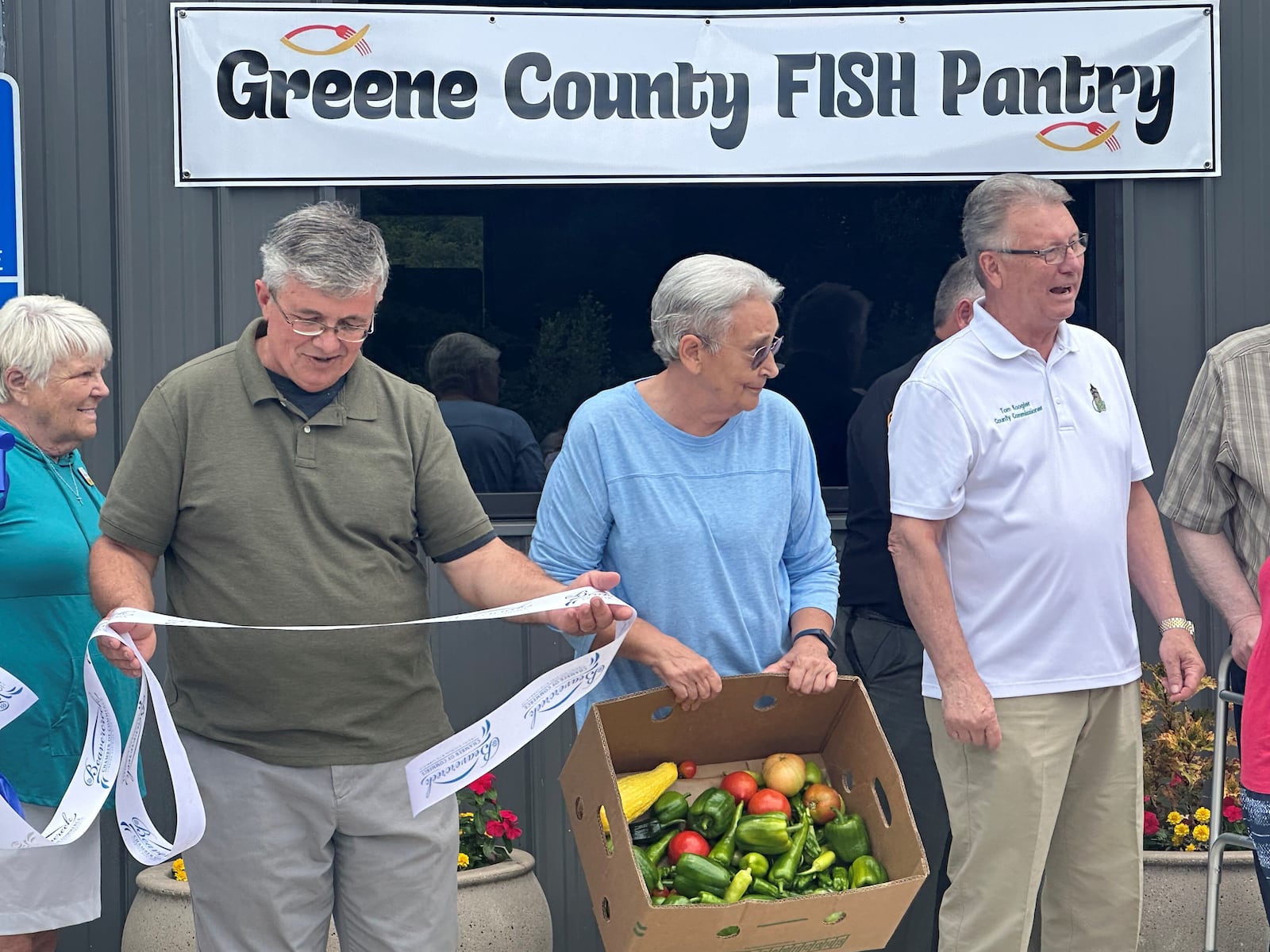 Greene County FISH Pantry celebrates taking ownership of its building in Xenia. ALIVIA HARTPENCE / STAFF